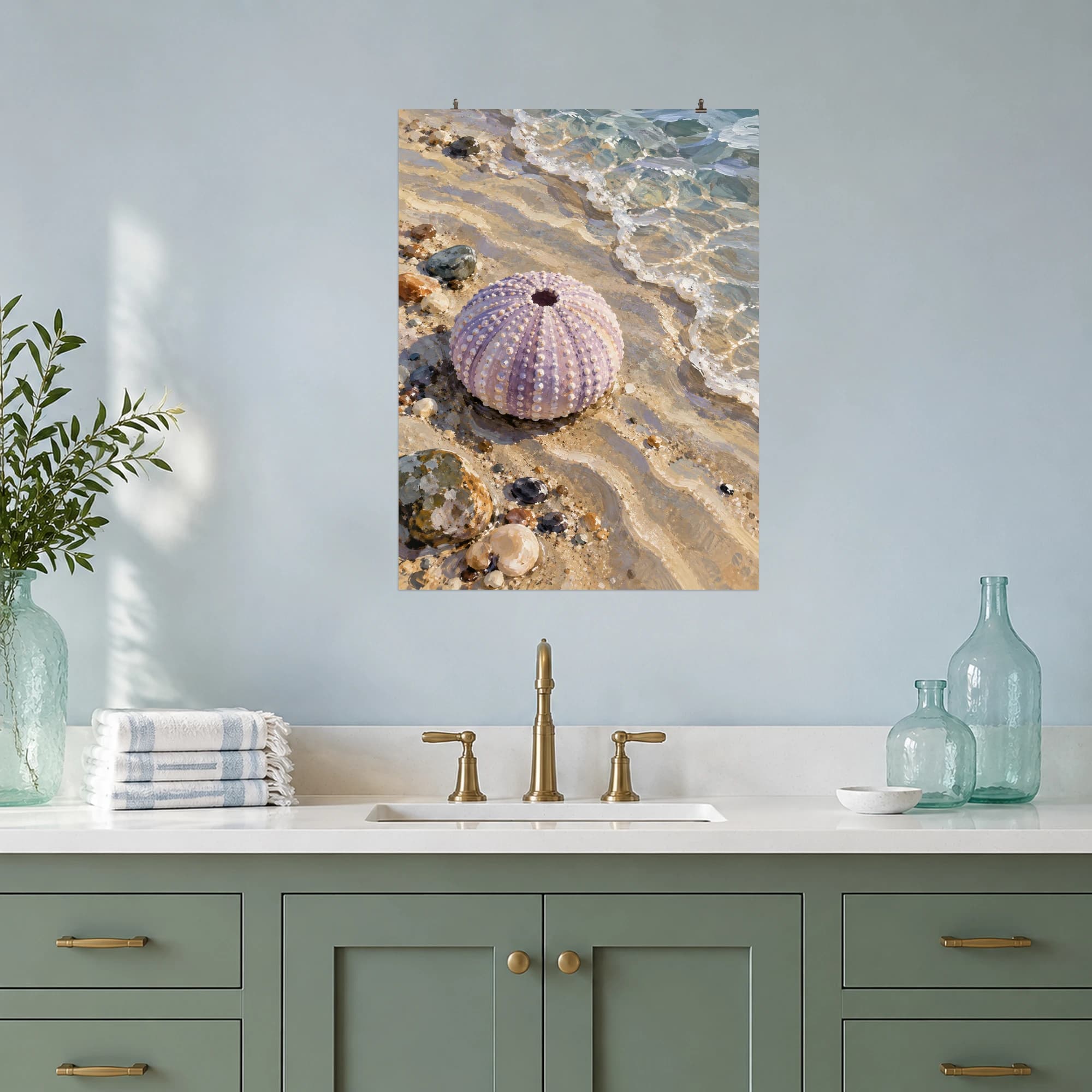This gouache-style composition features a pale lilac sea urchin shell on rippled sand with tiny pebbles and a transparent edge of water. Expressive brushwork and carefully balanced color bring a distinctive focal point to your wall.