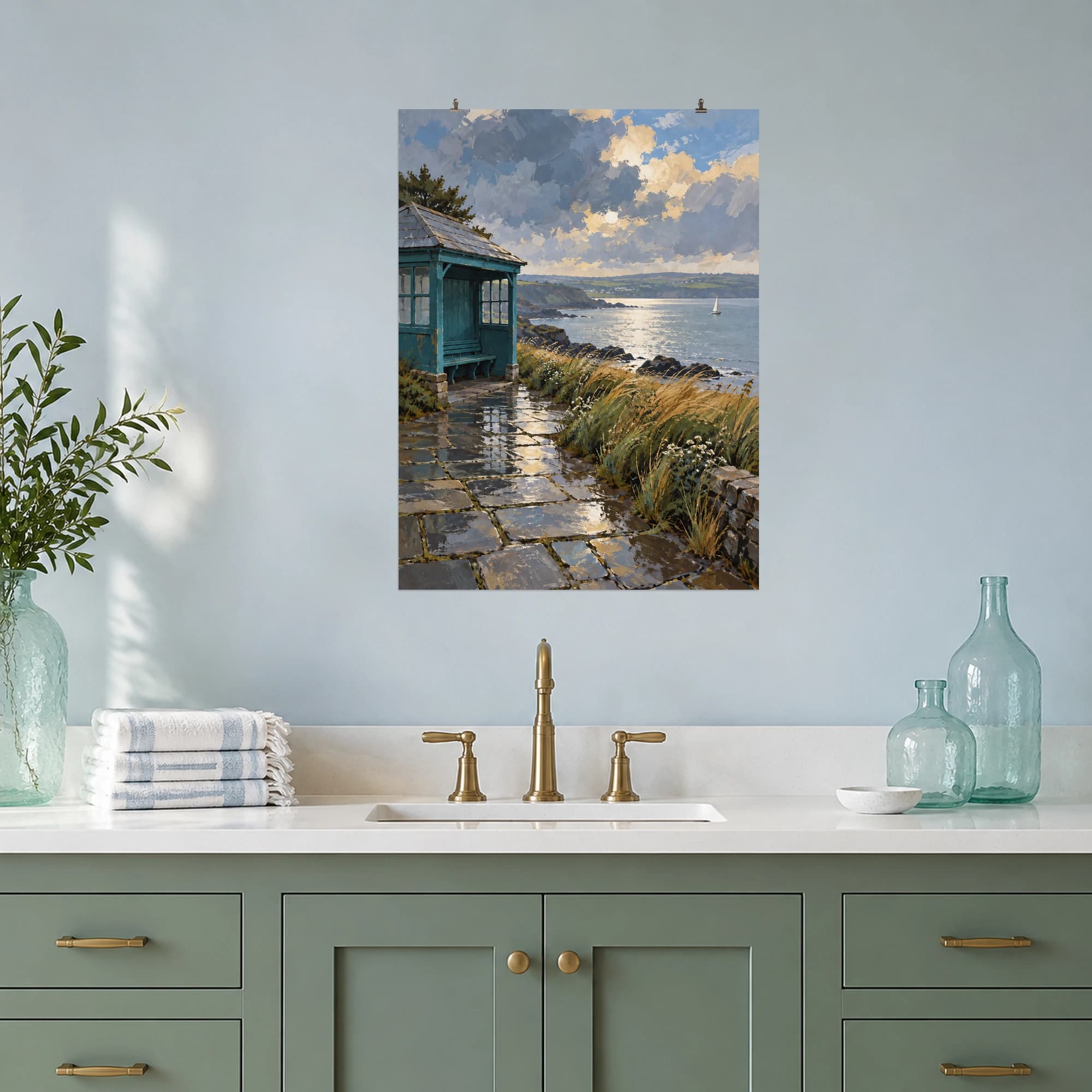 This gouache-style composition features a small teal seaside shelter overlooking a silver bay with wet paving stones and windswept grasses. Expressive brushwork and a balanced palette bring warmth and character to your space.