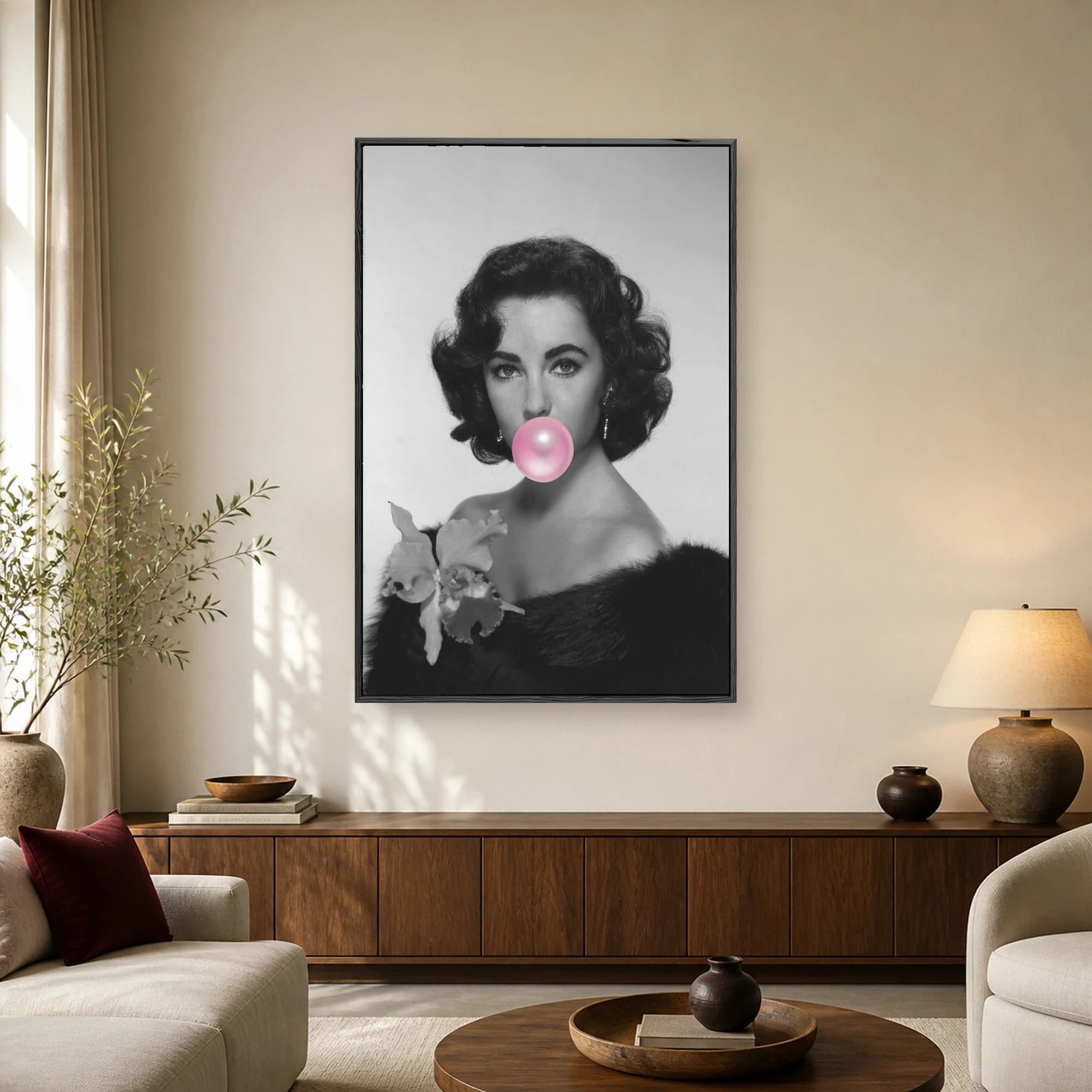 Vintage black-and-white portrait of a 1950s Hollywood actress wearing a fur stole and blowing a bright pink bubblegum bubble
