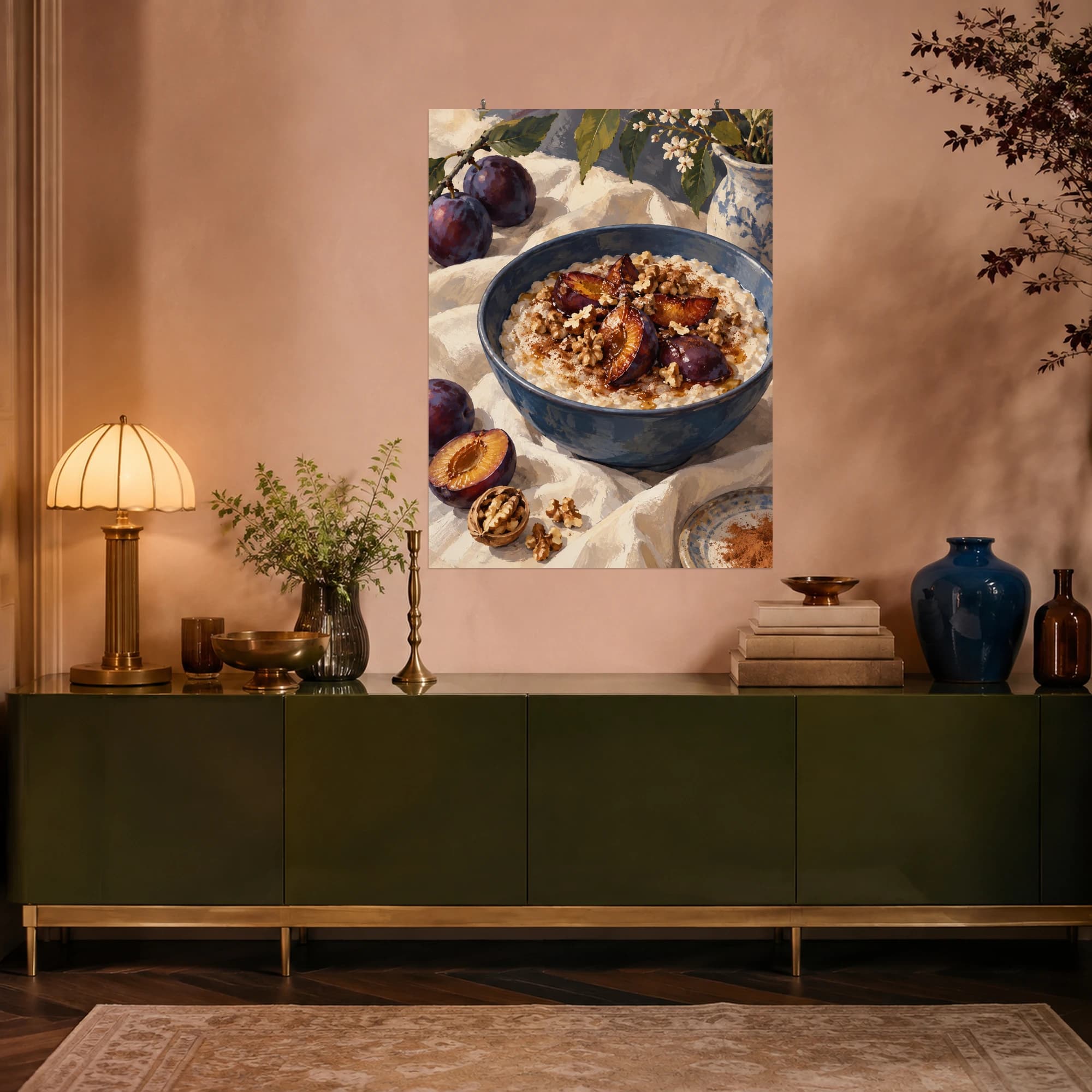 This gouache-style composition features a warm bowl of creamy porridge topped with roasted purple plums, walnuts and cinnamon, a dusky blue bowl on cream linen. Expressive brushwork and a balanced palette bring warmth and character to your space.