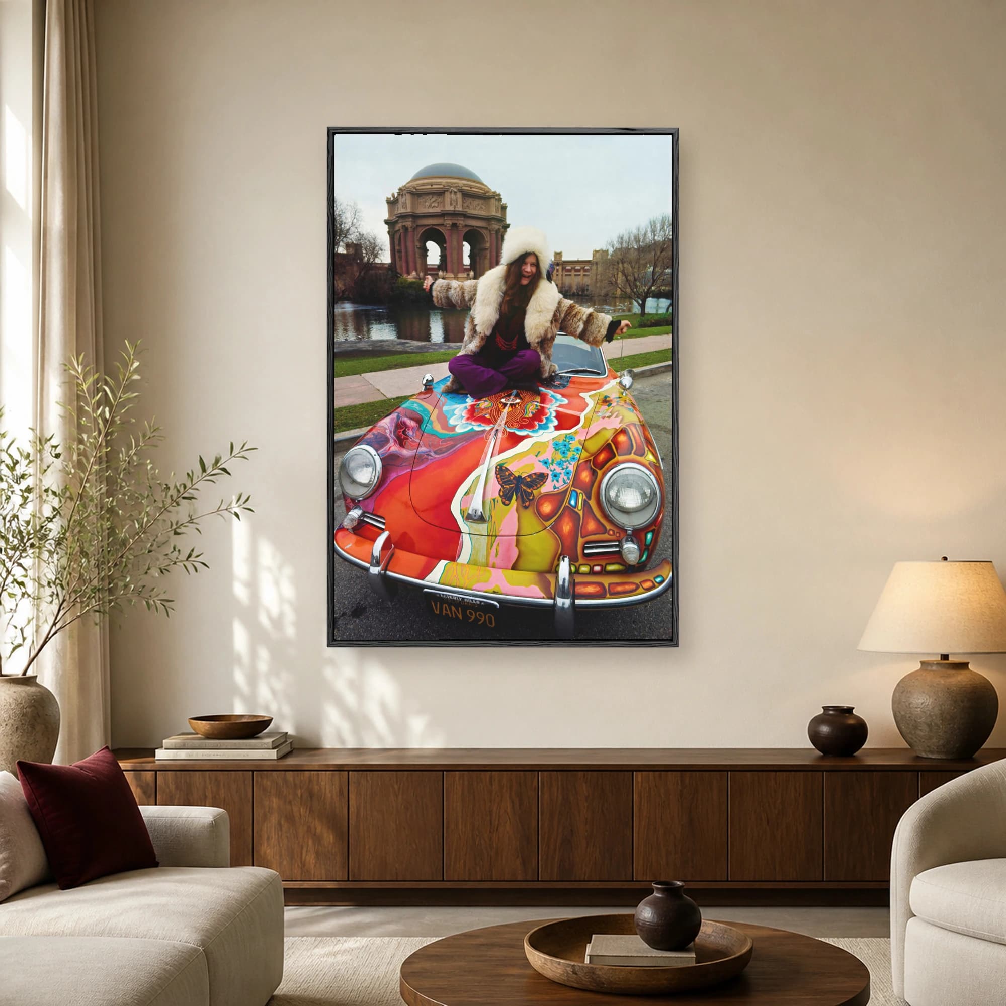 Janis Joplin sitting cross-legged on the hood of her brightly painted psychedelic Porsche in front of the Palace of Fine Arts in San Francisco