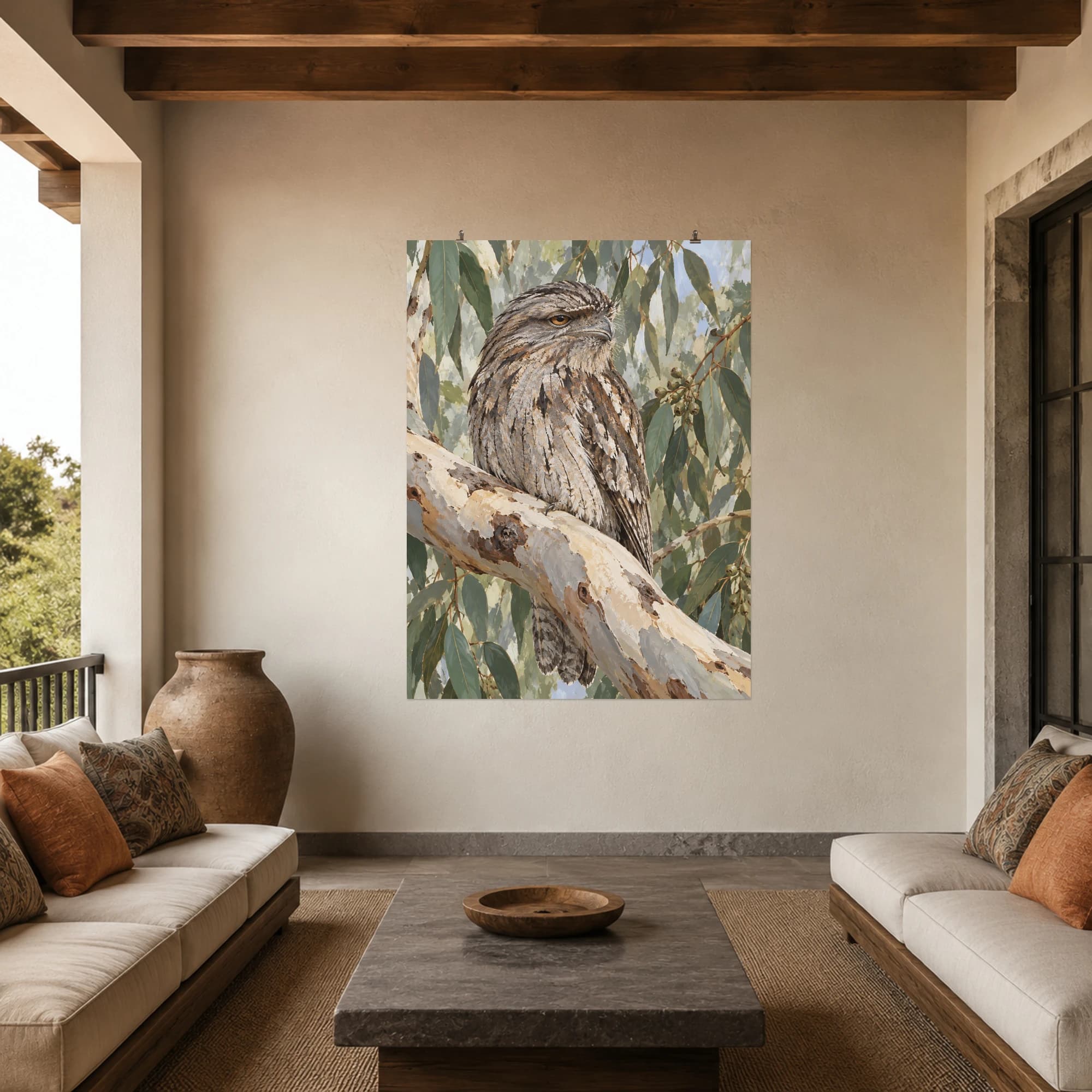 This gouache-style composition features a tawny frogmouth resting on a pale gum branch with soft grey green foliage. Expressive brushwork and carefully balanced color bring a distinctive focal point to your wall.