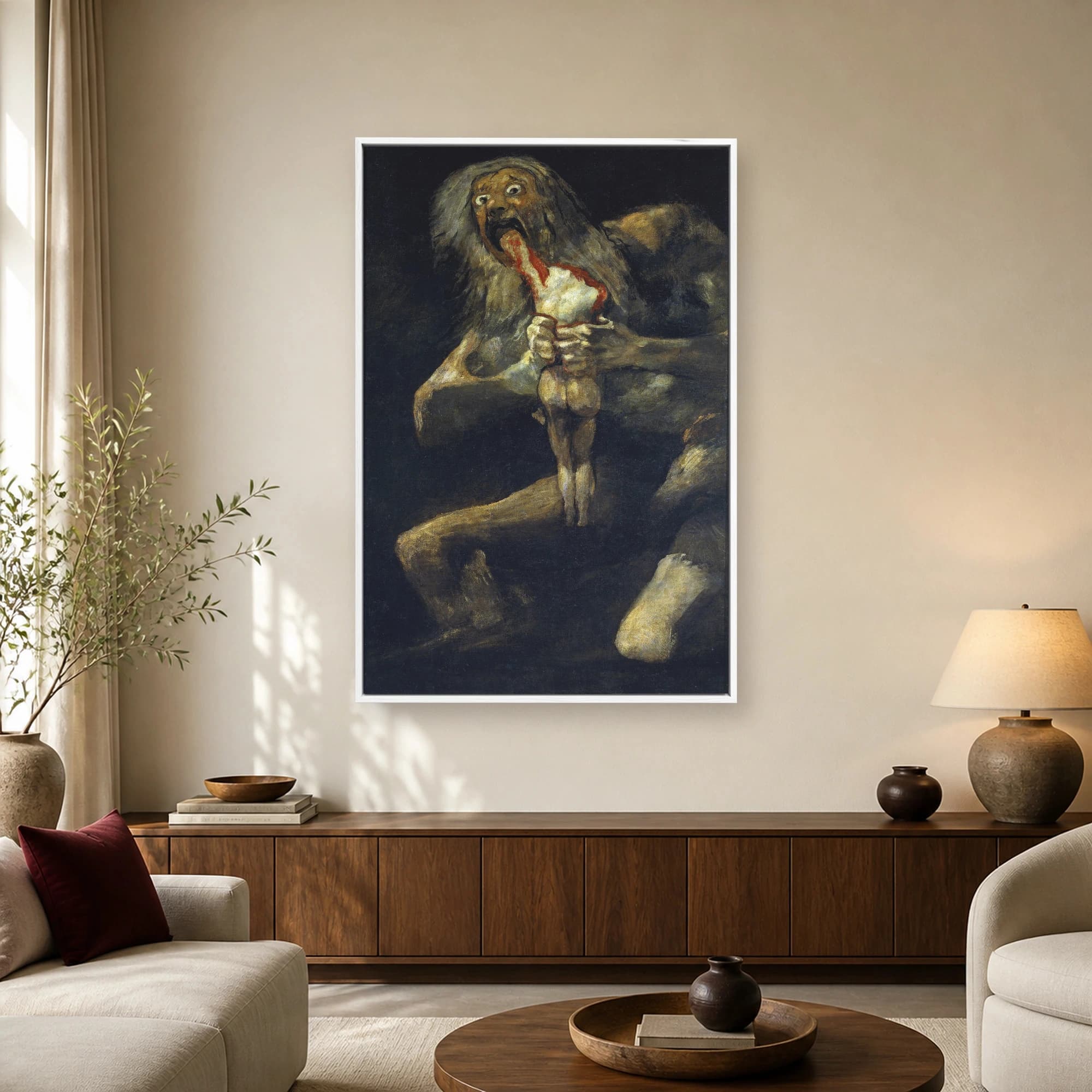 Fine art print of Francisco Goya's Saturn Devouring His Son showing a terrified giant consuming a body against a dark background