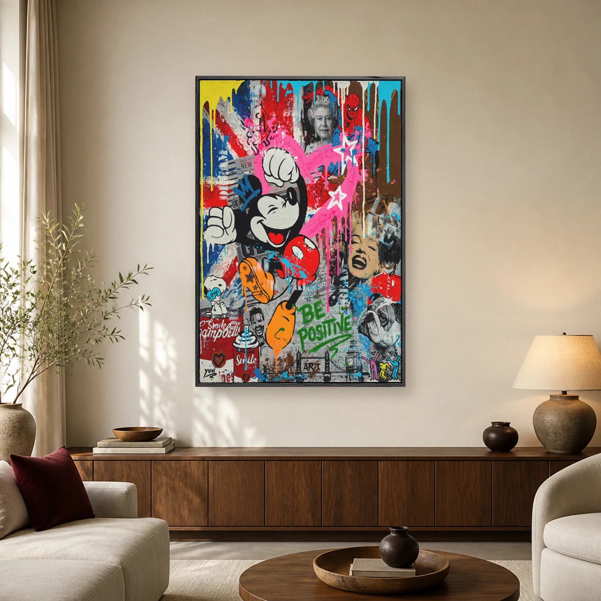 Vibrant street art collage featuring Mickey Mouse, Queen Elizabeth II, Marilyn Monroe, and Spider-Man over a Union Jack flag with paint splatters.