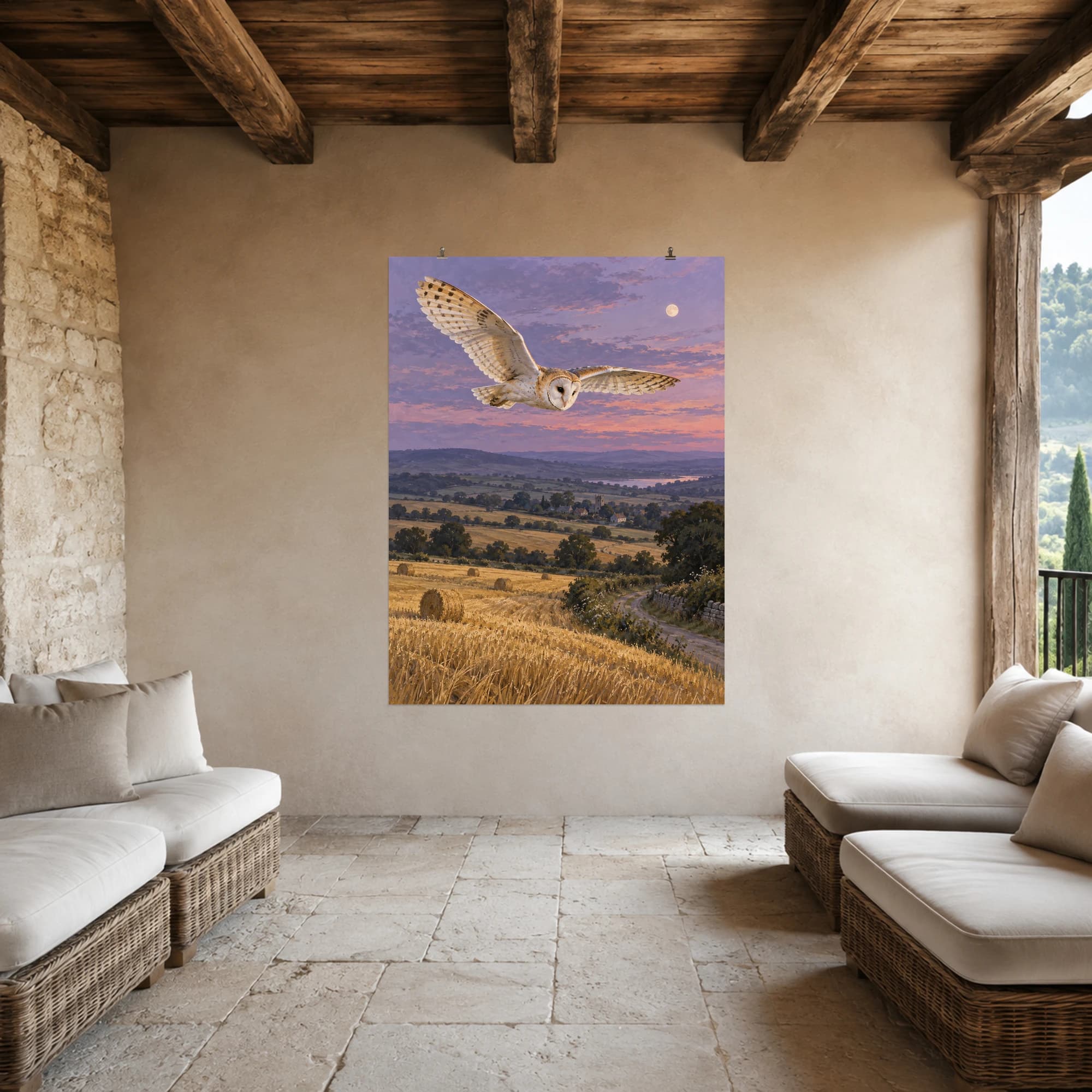 A barn owl glides over golden fields as a pale moon rises.