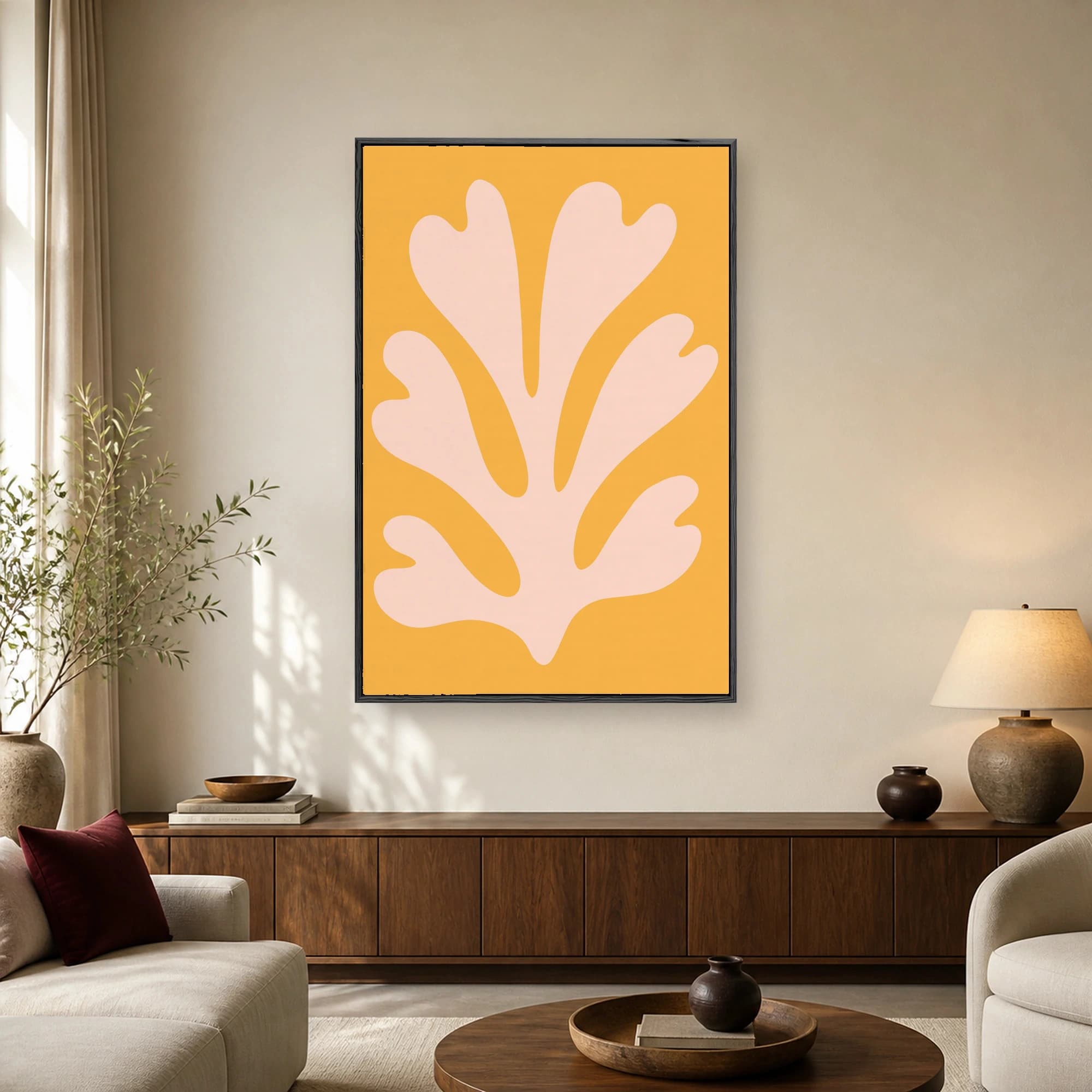 Minimalist abstract art print featuring a soft peach organic botanical cutout shape on a vibrant warm yellow background.