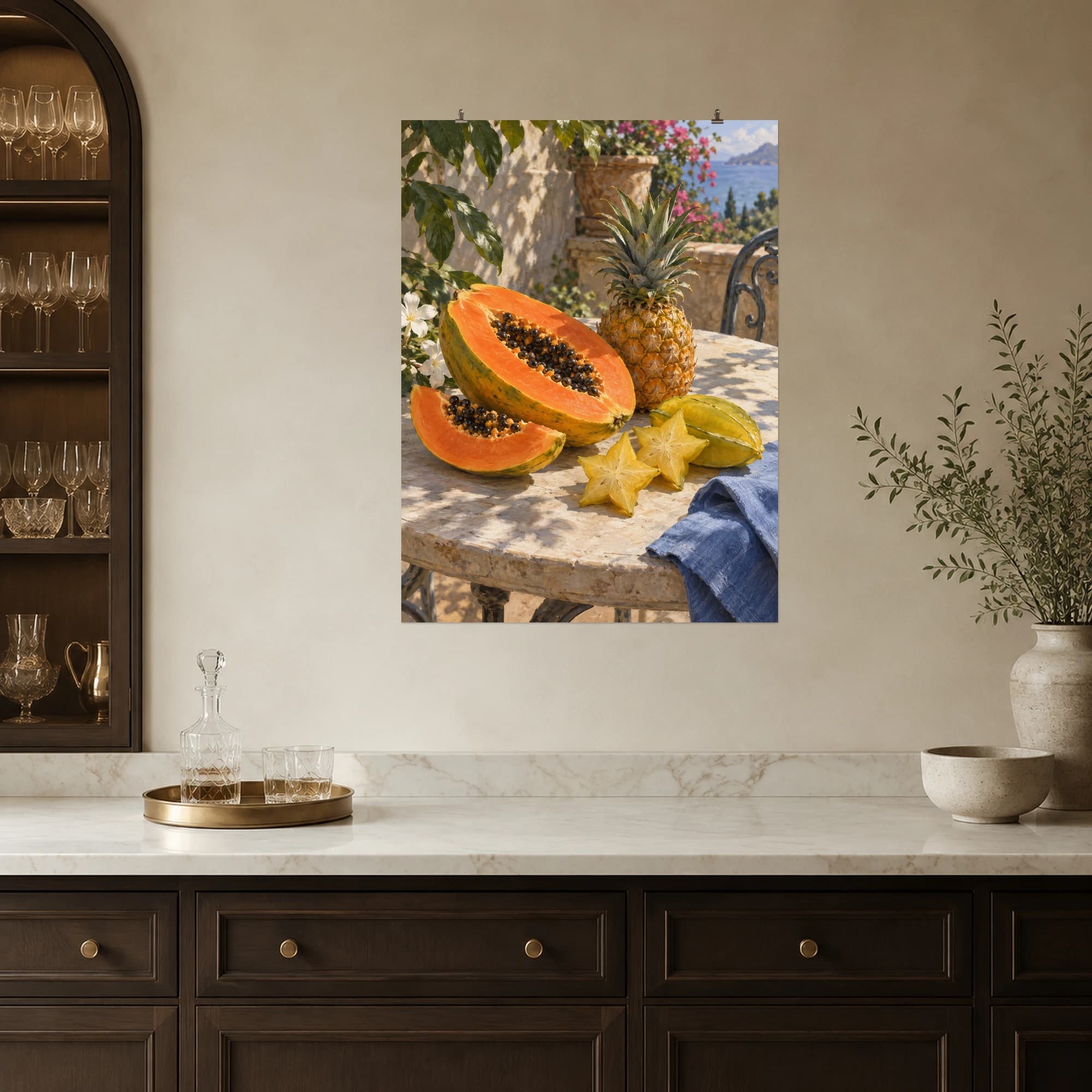 Papaya, star fruit and pineapple form a colorful still life on a garden stone table. Tropical greens frame the warm fruit tones.