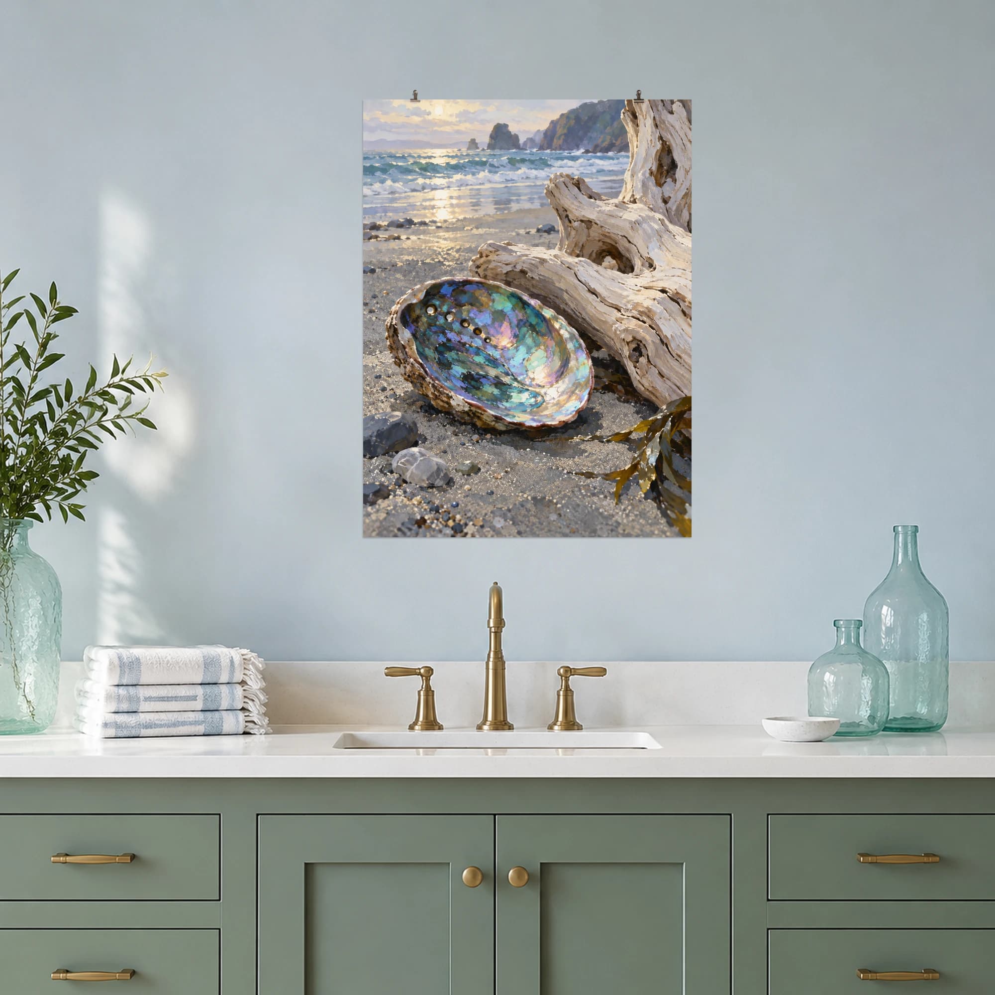 This gouache-style composition features an iridescent abalone shell beside ivory driftwood on cool grey sand with soft ocean light. Expressive brushwork and carefully balanced color bring a distinctive focal point to your wall.