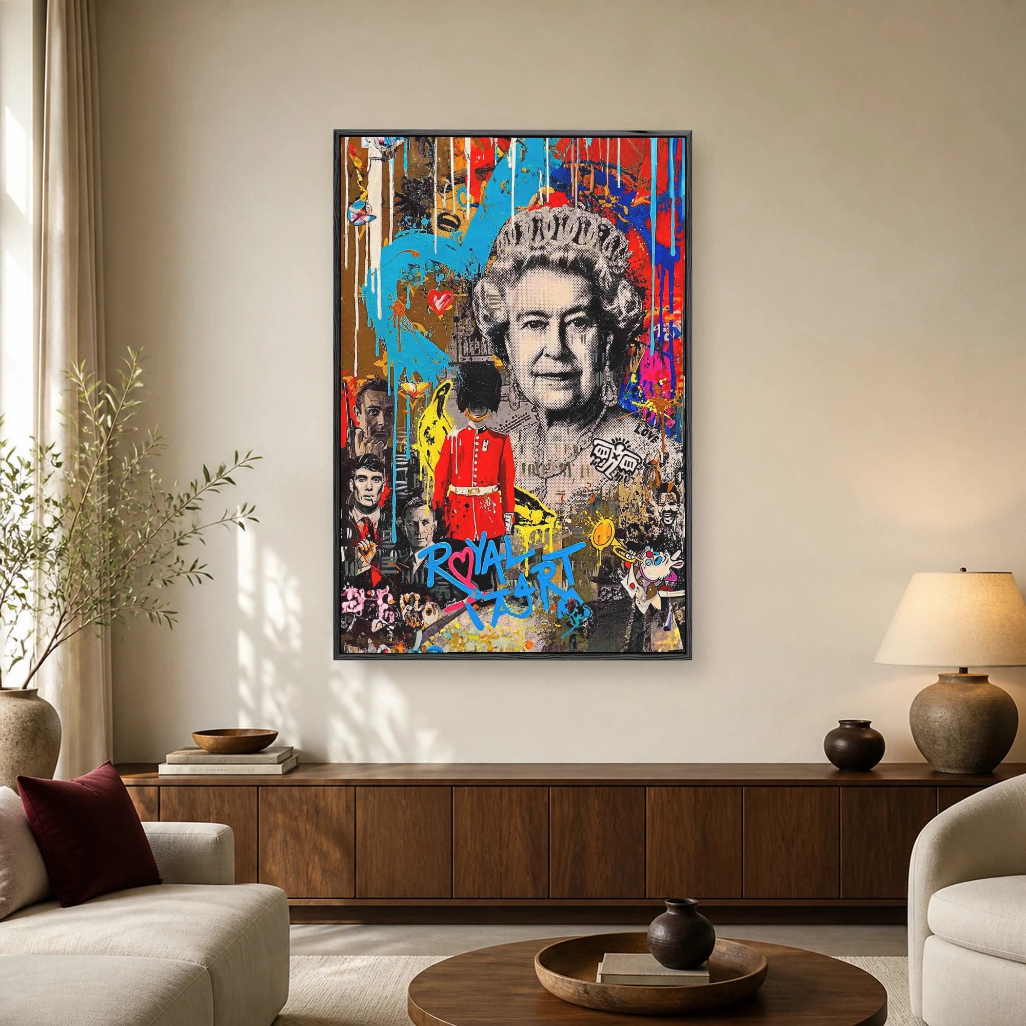 Urban pop art canvas featuring a monochrome portrait of Queen Elizabeth II, a British King's Guard, and blue spray paint drips over a collage background.