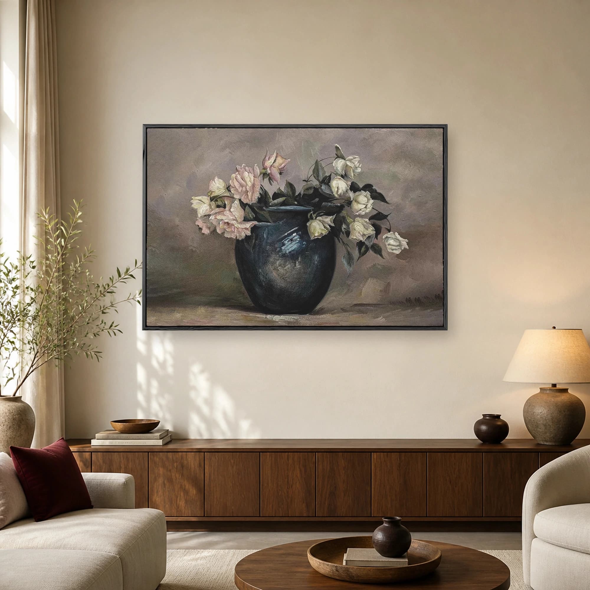 Fine art still life painting of soft pink and cream roses in a dark blue ceramic vase against a muted textured background.