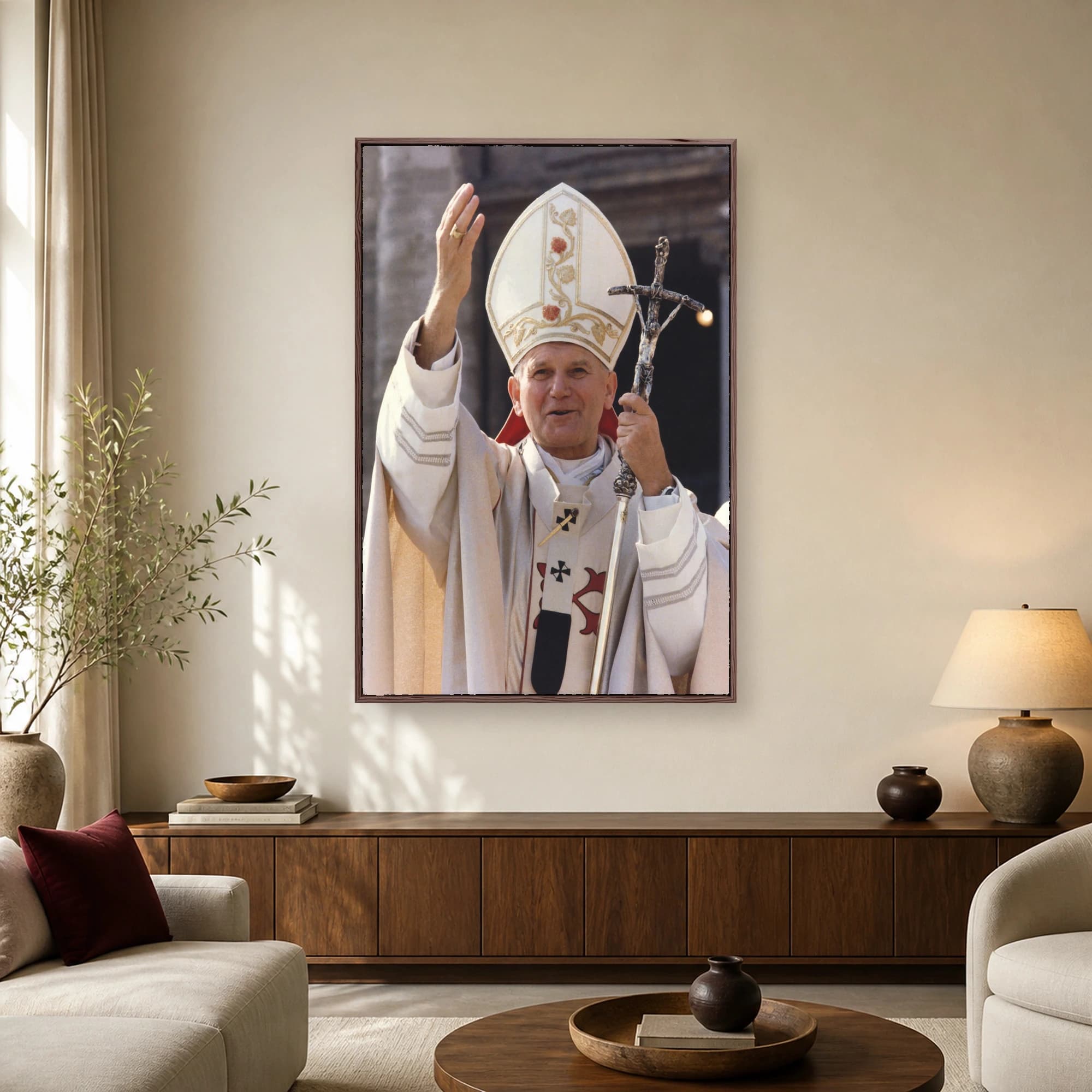 Historic photograph of Pope John Paul II in white vestments and mitre raising his hand in blessing while holding a silver crucifix staff
