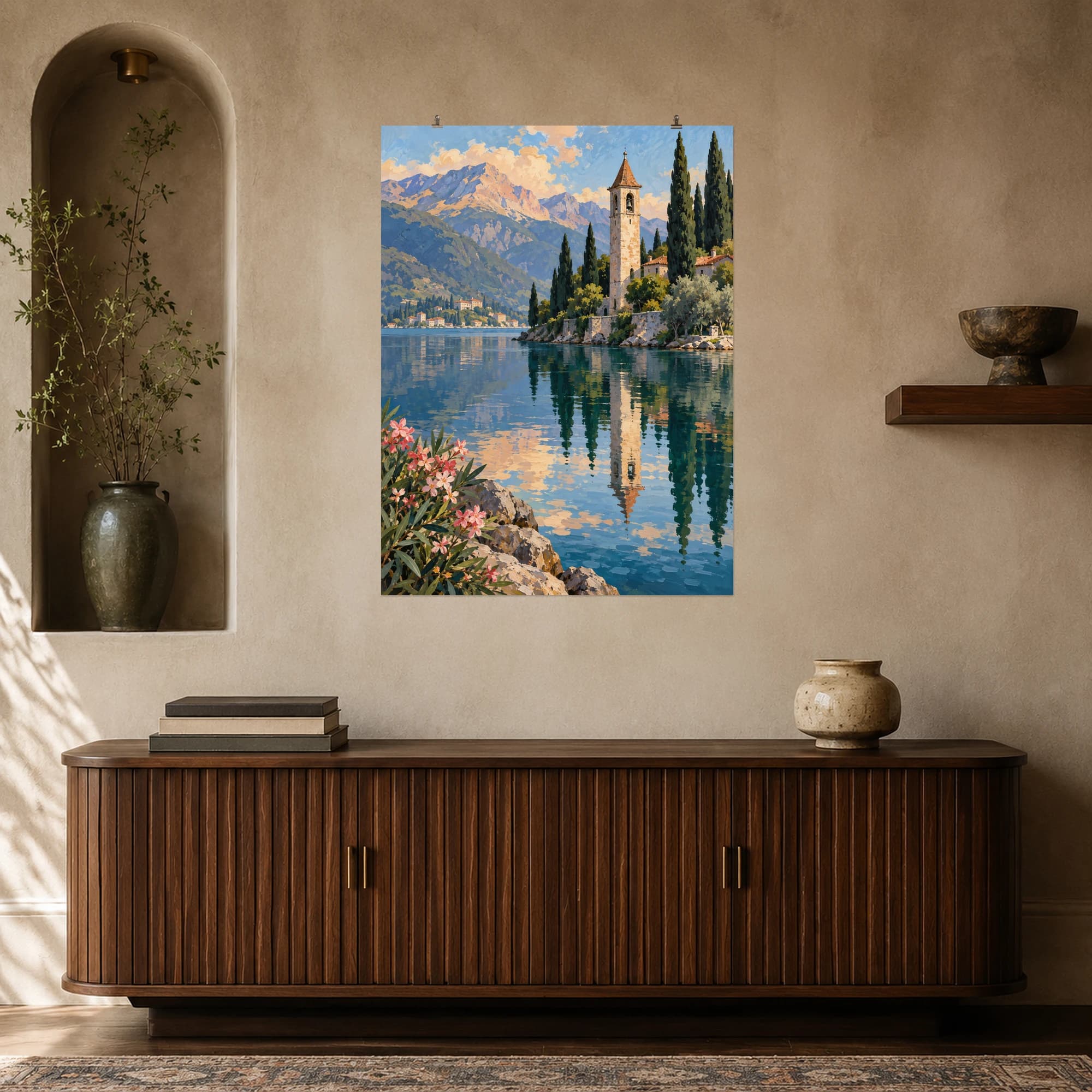 This gouache-style composition features a slender stone bell tower reflected in a calm lake with mountains and cypress trees. Expressive brushwork and carefully balanced color bring a distinctive focal point to your wall.