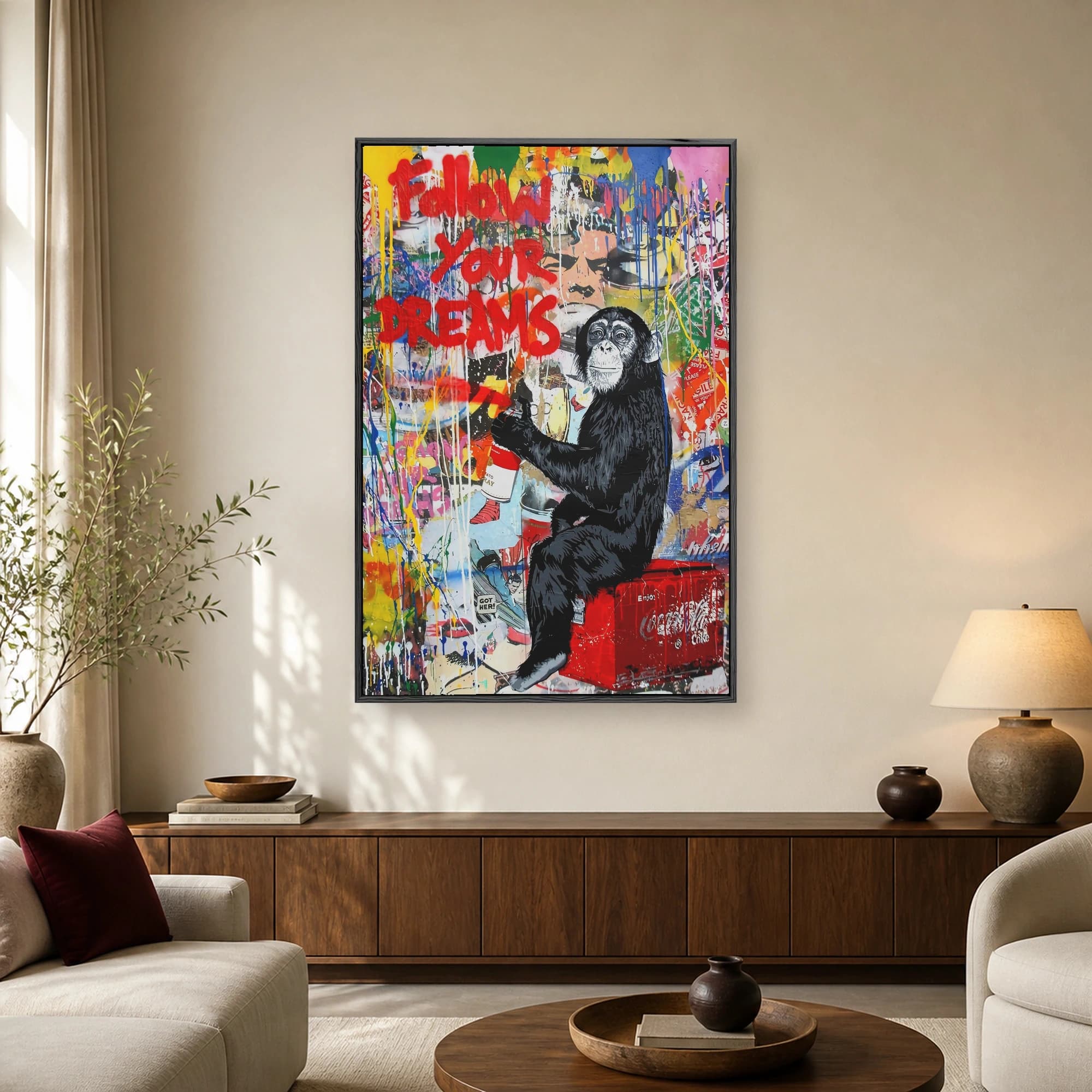 A vibrant pop art canvas depicting a chimpanzee holding a spray paint can in front of a colorful graffiti wall with bold red text reading Follow Your Dreams.