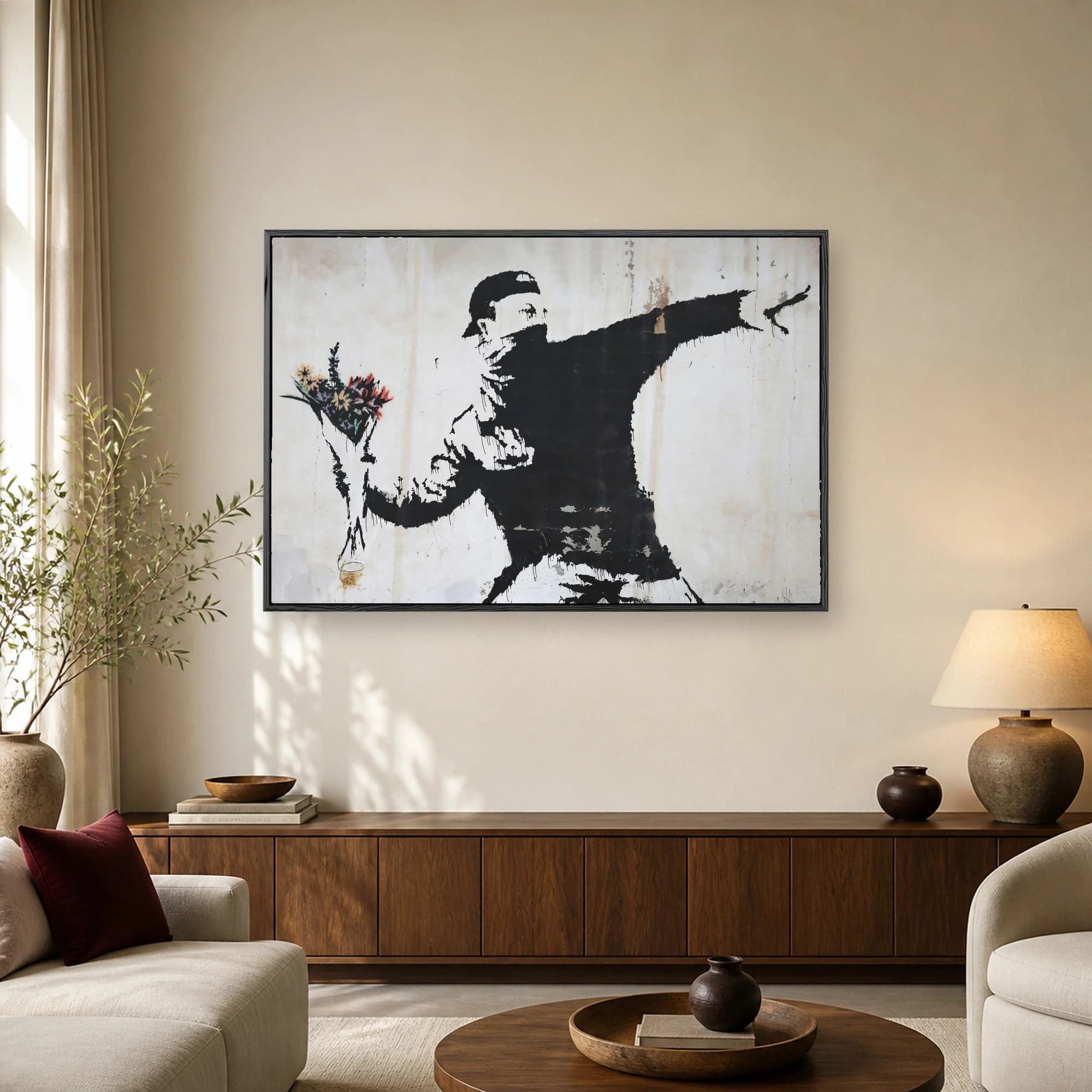Stencil graffiti street art print showing a masked protestor throwing a colorful bouquet of flowers against a distressed wall.