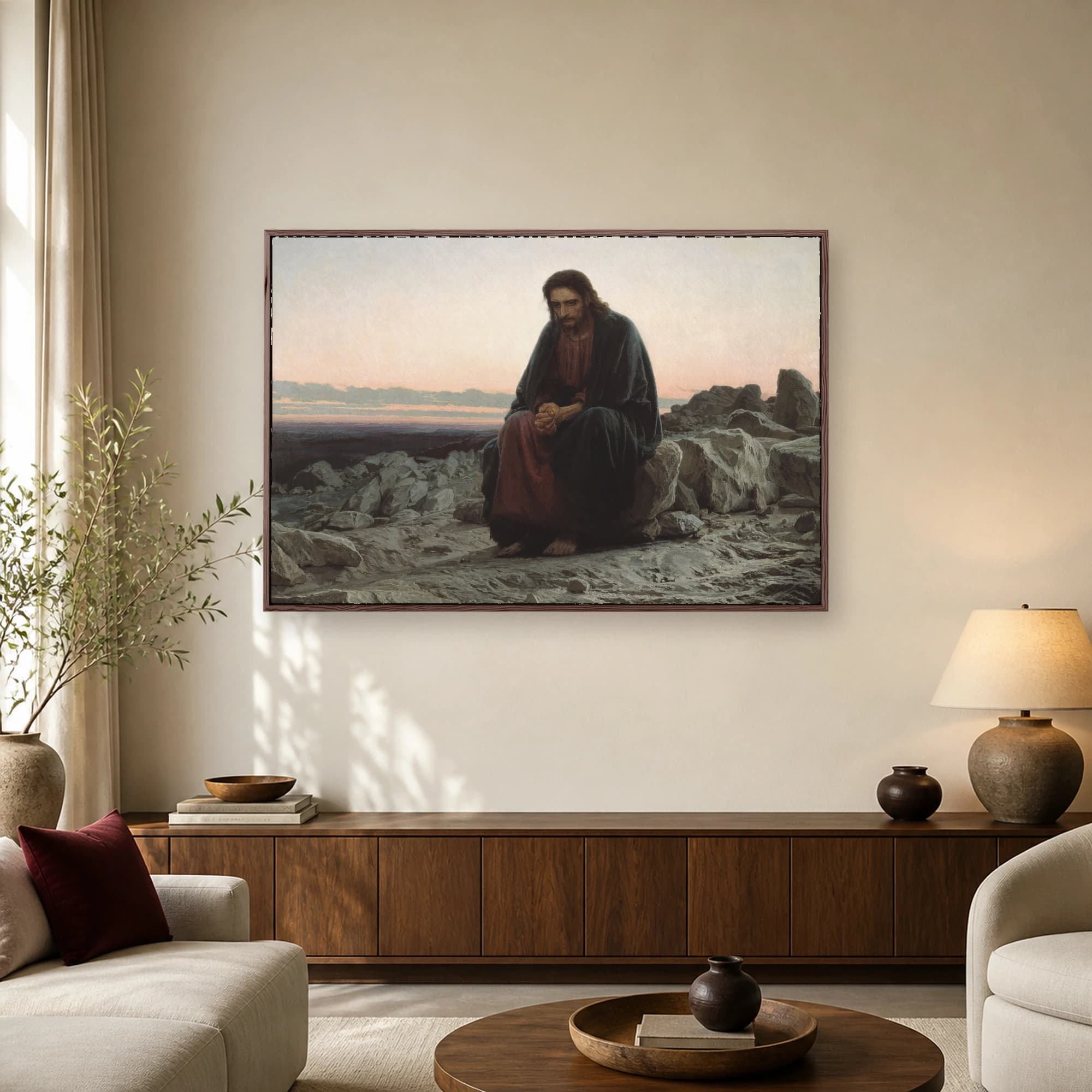 Fine art print of Christ in the Wilderness showing Jesus seated alone on a grey rock in a rocky landscape during twilight.