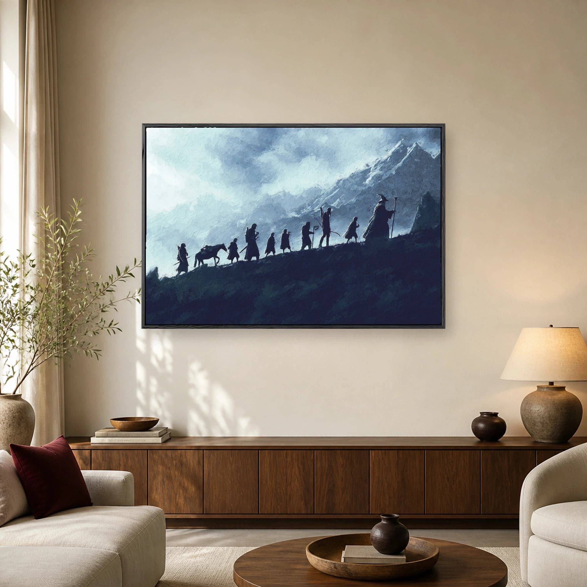 Silhouettes of a group of adventurers and a wizard journeying up a snowy mountain ridge under a dramatic sky in blue tones.