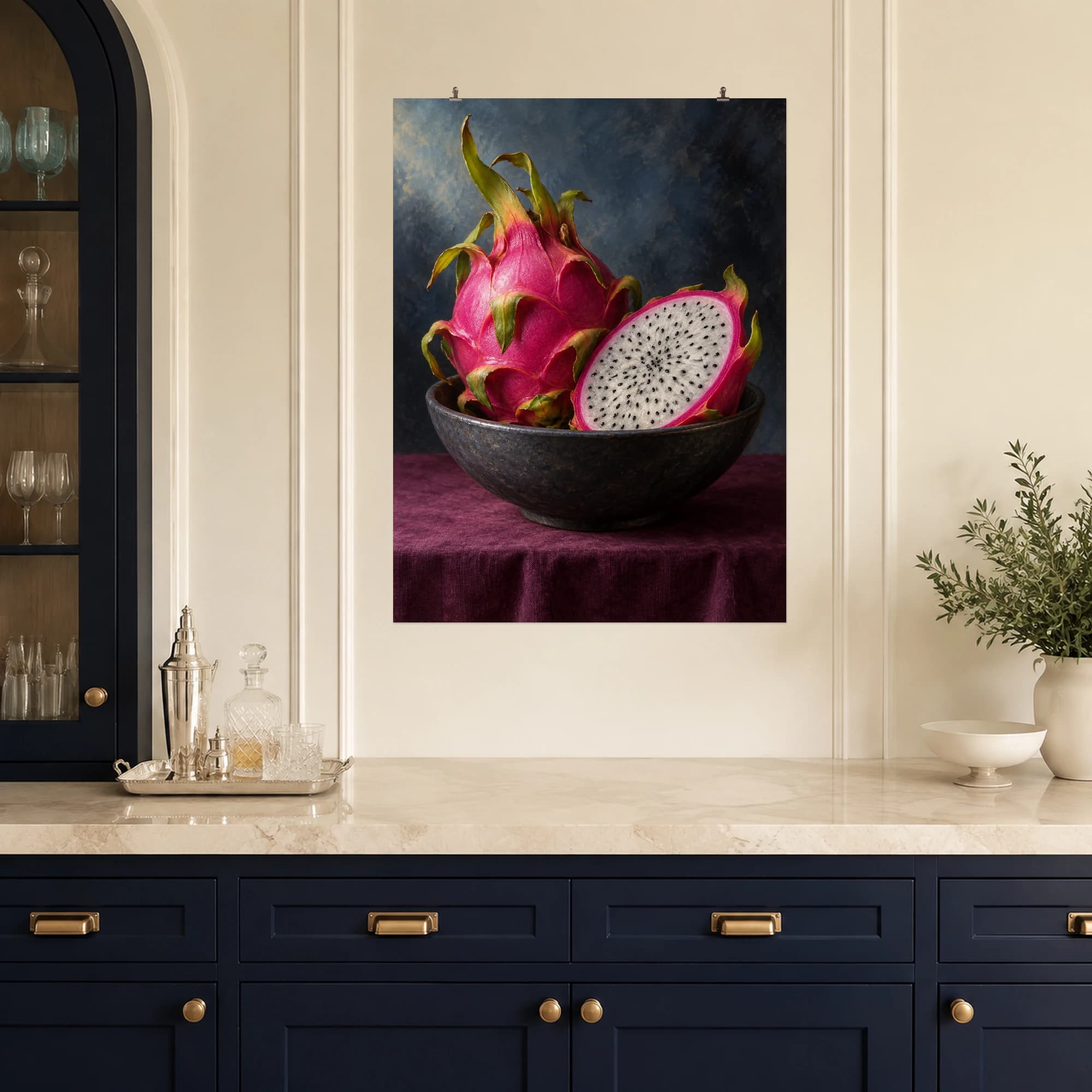 Pink dragon fruit rests beside a cut half in a dark ceramic bowl.