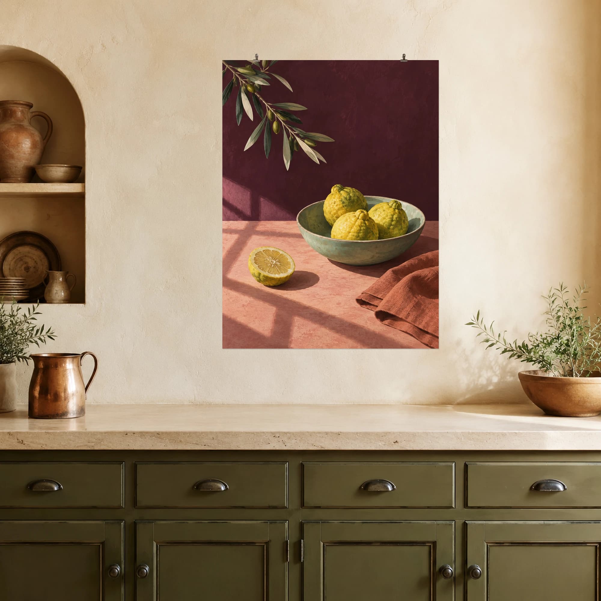 A celadon bowl of golden bergamot, a cut citrus half and soft window shadows create a quiet Mediterranean morning. Dusty rose, olive green and deep plum bring a warm, thoughtful accent to a kitchen or dining space.