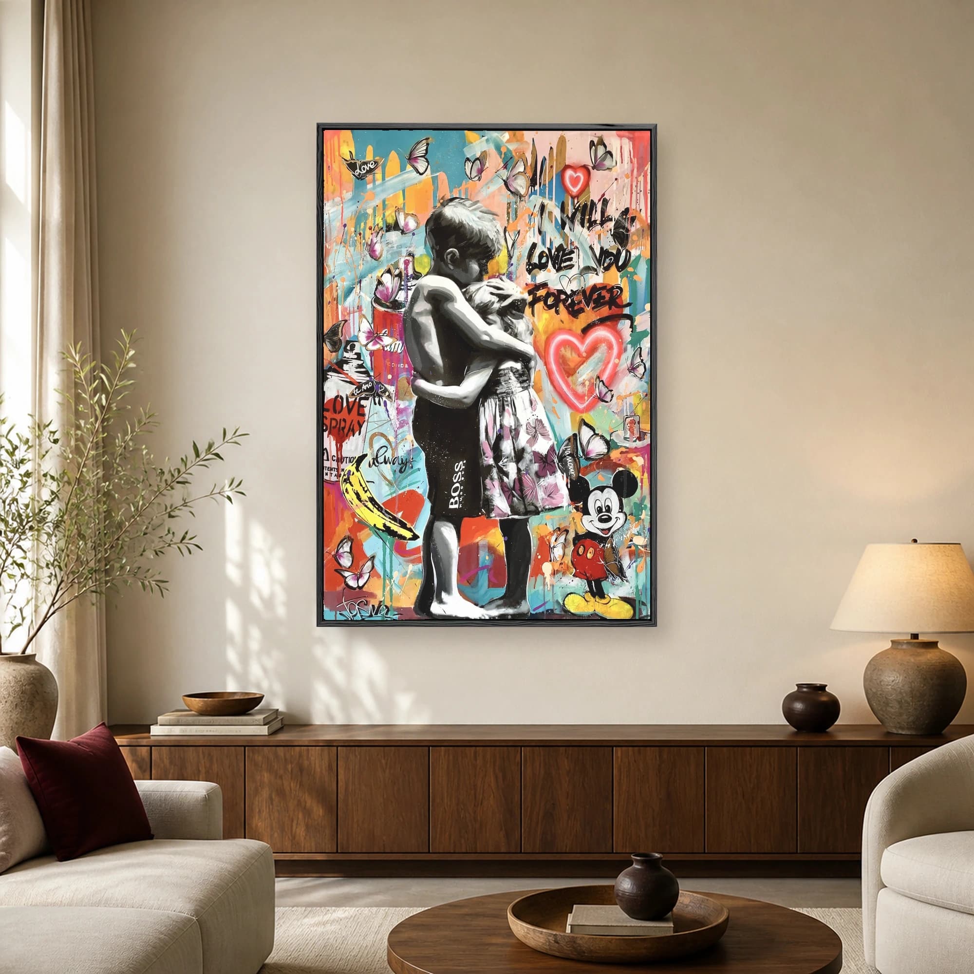 A colorful pop art canvas showing a monochrome boy and girl hugging amidst spray paint, neon hearts, butterflies, and Mickey Mouse.