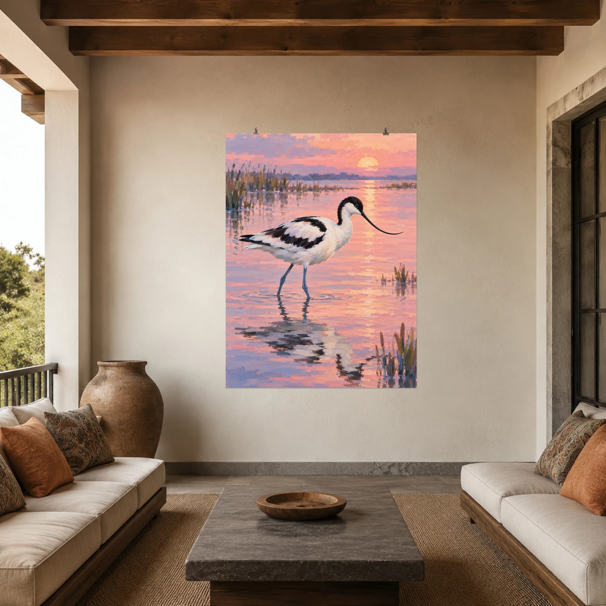 This gouache-style composition features an avocet wading in pale pink reflected dawn water with a graceful curved beak. Expressive brushwork and carefully balanced color bring a distinctive focal point to your wall.