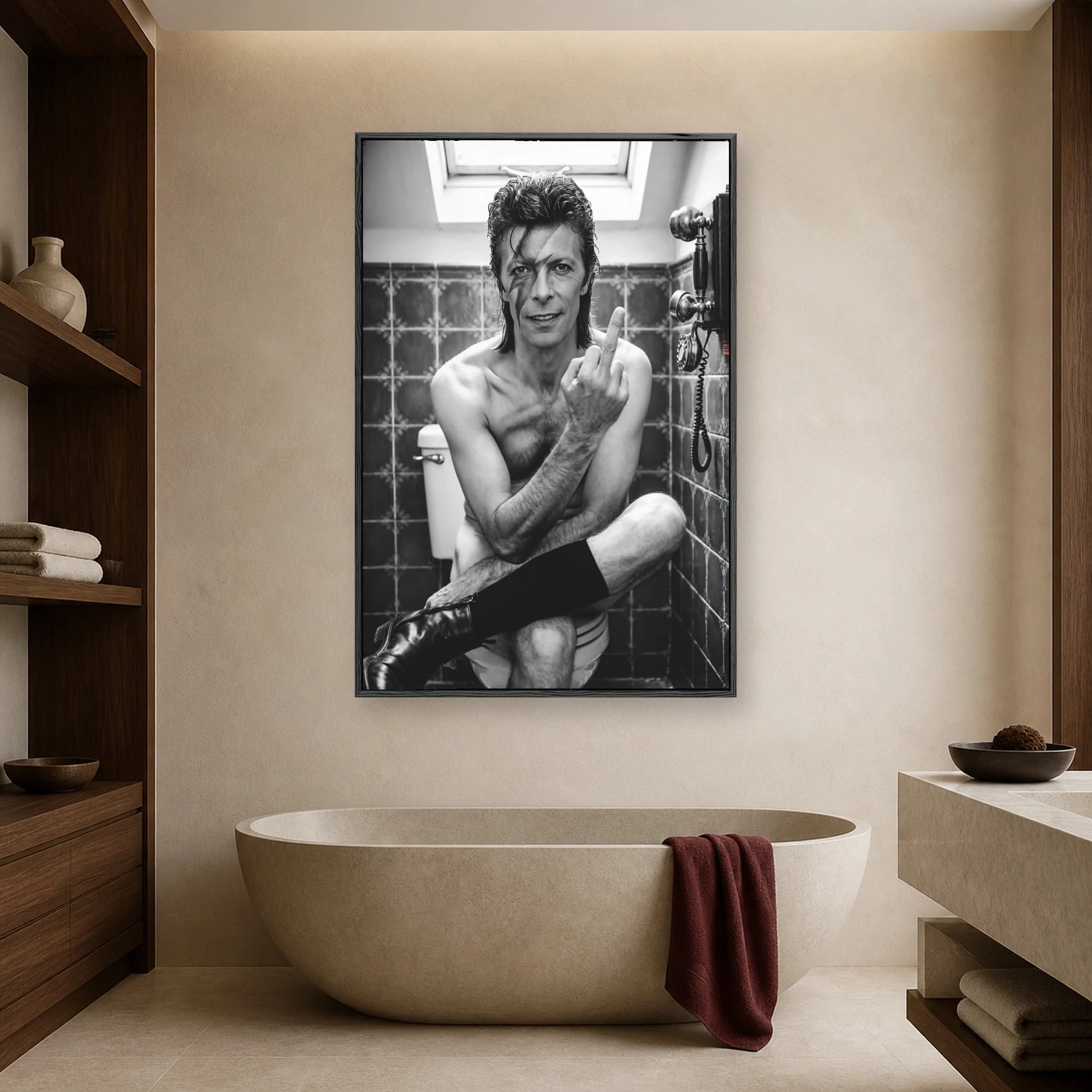 Black and white portrait of a David Bowie lookalike with facial lightning bolt makeup sitting on a toilet giving the middle finger in a tiled bathroom.