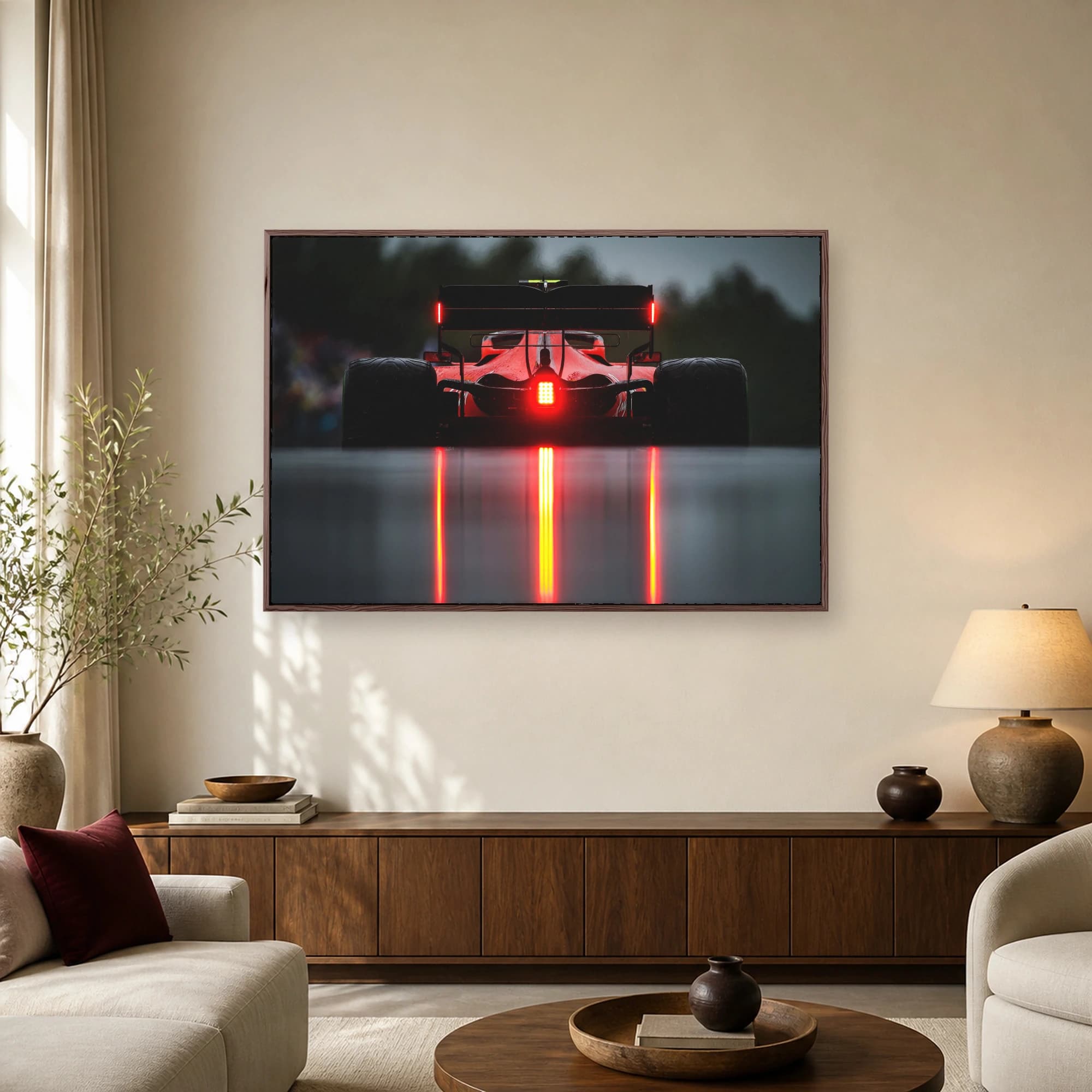Rear view of a Formula One racing car on a wet track with glowing red lights and reflections.