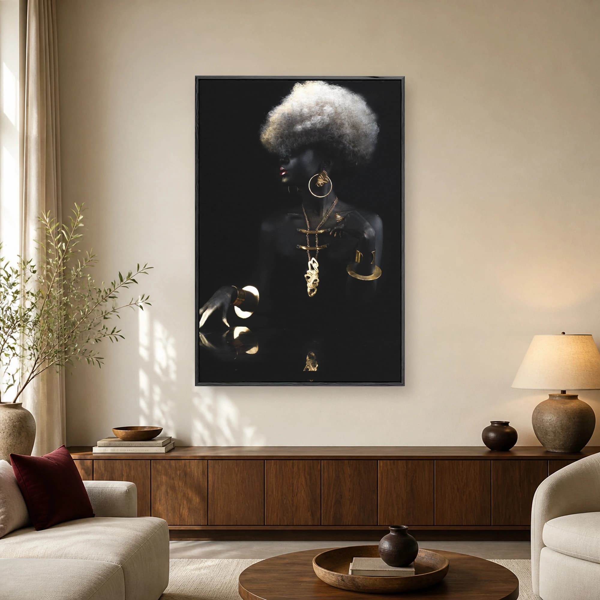 Fine art portrait of a Black woman with black body paint, gold jewelry, and a silver-white afro against a dark background