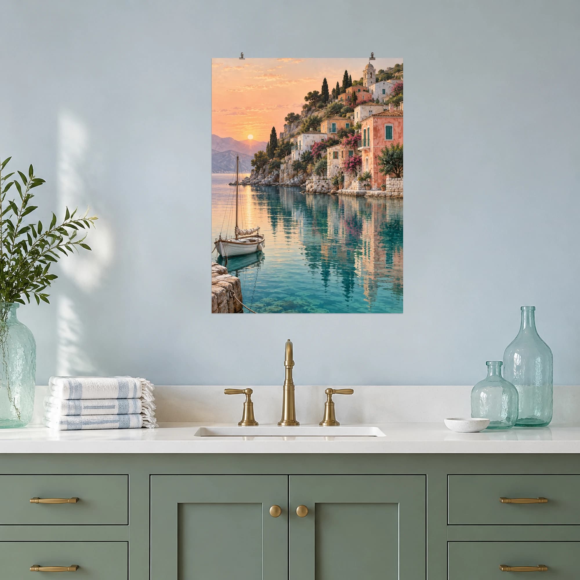 A moored sailboat rests in a still harbor beneath pastel village rooftops.