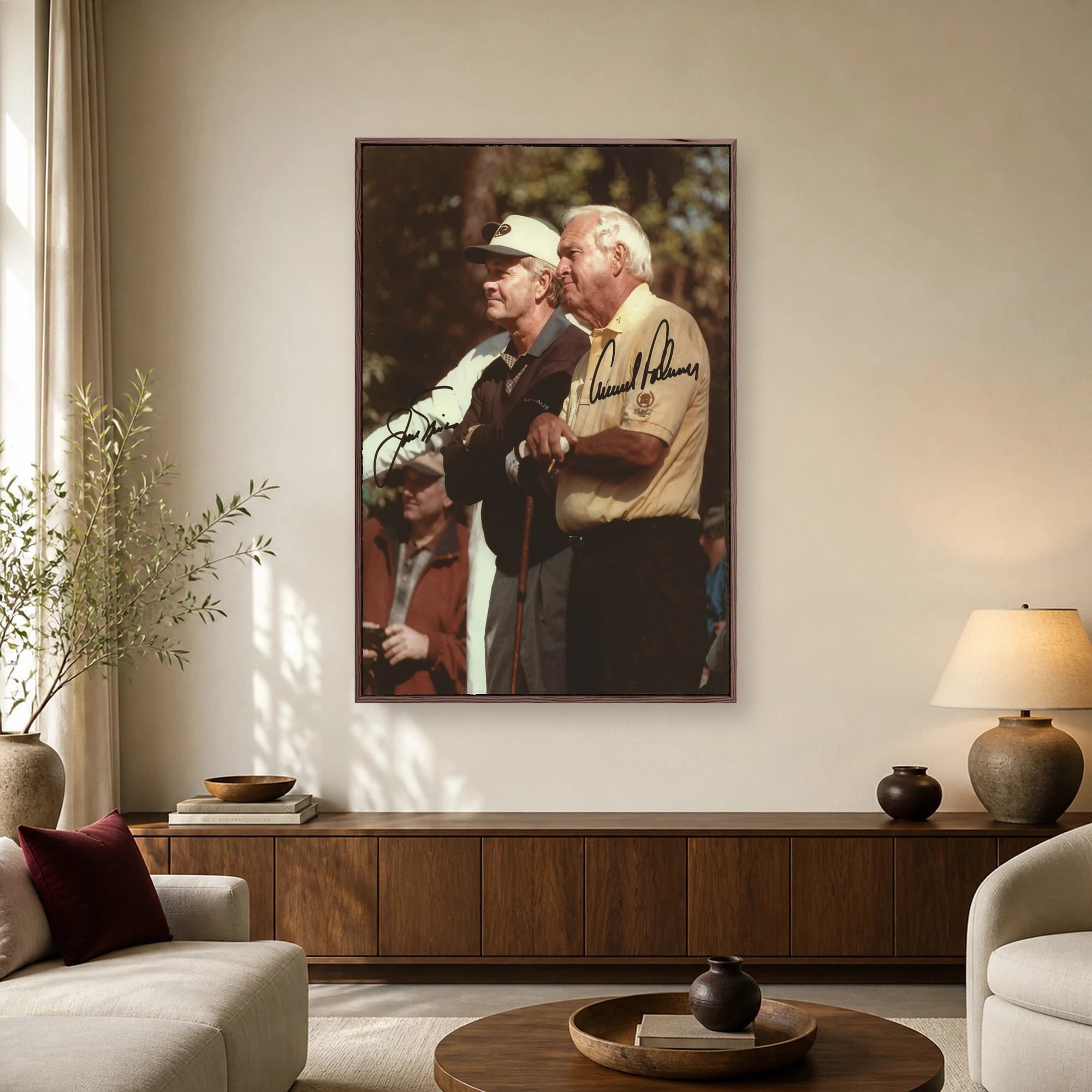 Vintage photograph of golf legends Arnold Palmer in a yellow shirt and Jack Nicklaus in a dark cap with signature overlays on a golf course.