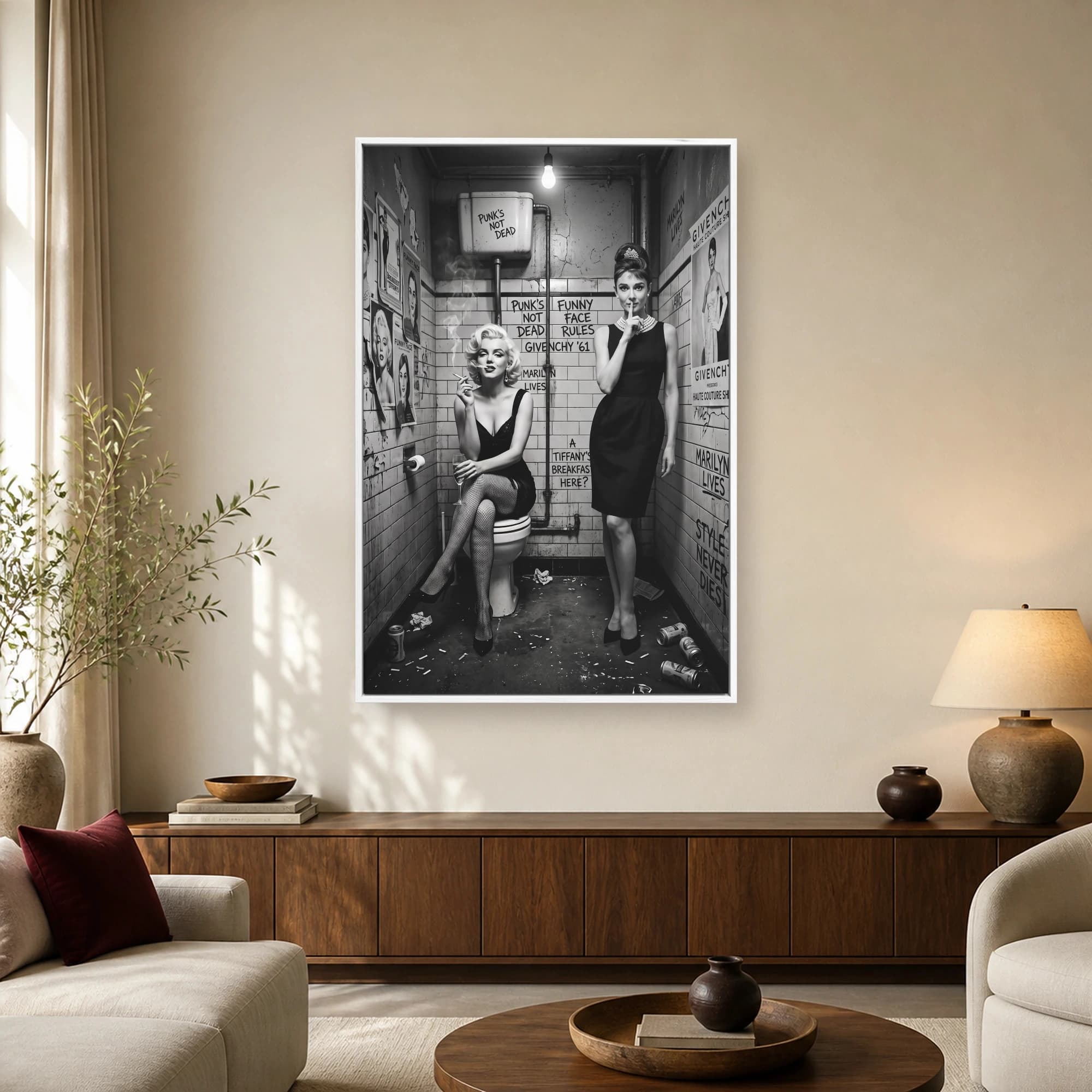 Grayscale photographic parody artwork showing Marilyn Monroe smoking on a toilet and Audrey Hepburn shushing next to graffiti-covered restroom tiles.