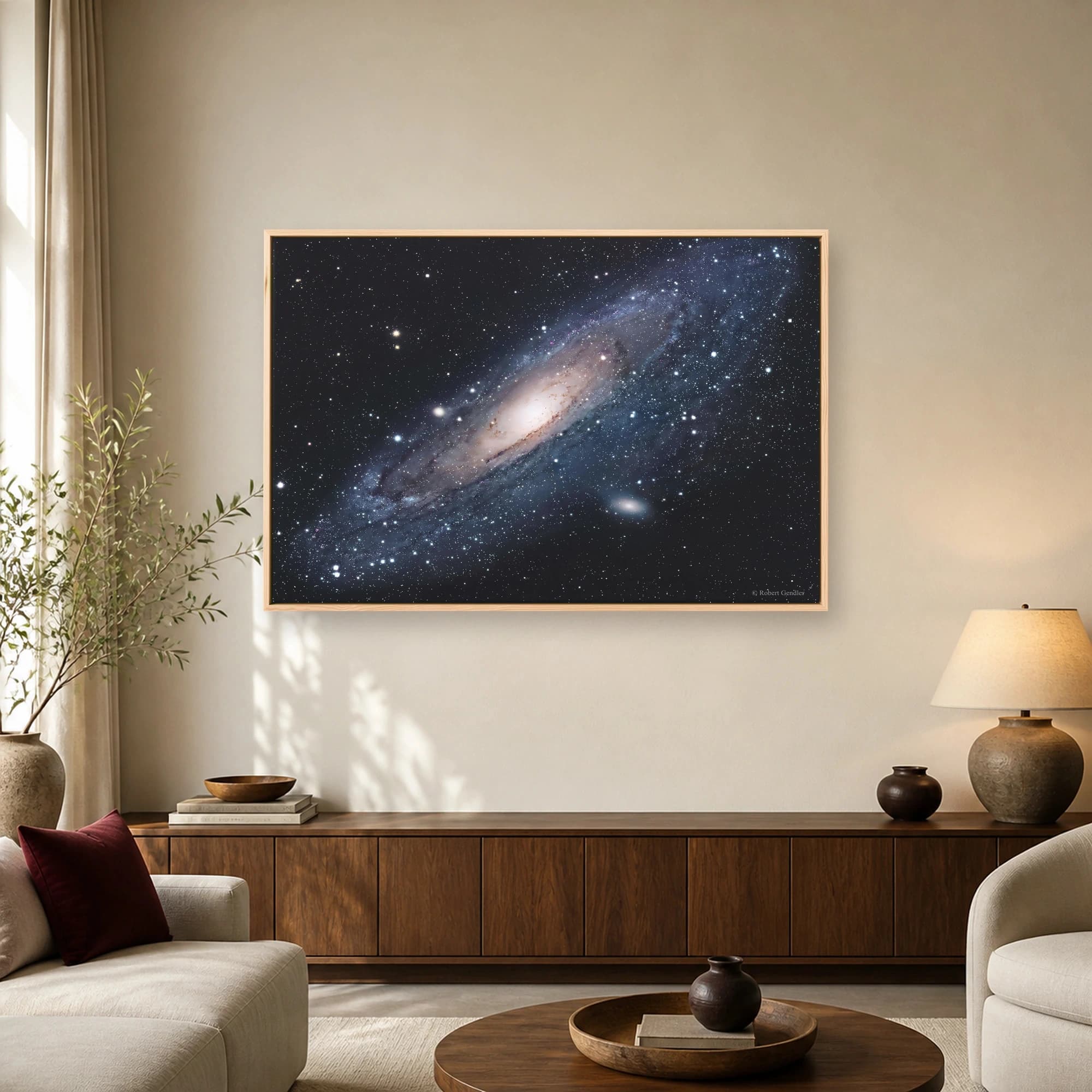 Detailed astrophotography of the Andromeda Galaxy showing its bright core, spiral arms, and thousands of stars against a dark space background.