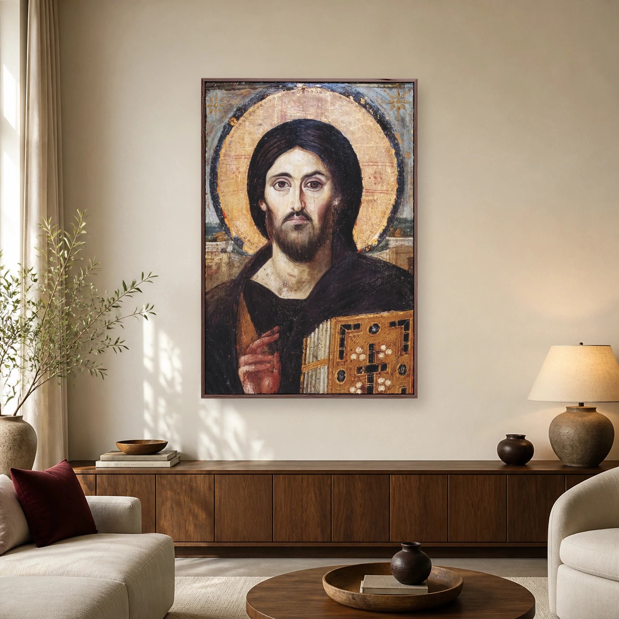 Historical Byzantine icon of Christ Pantocrator with gold halo and dark hair holding an ornate gospel book