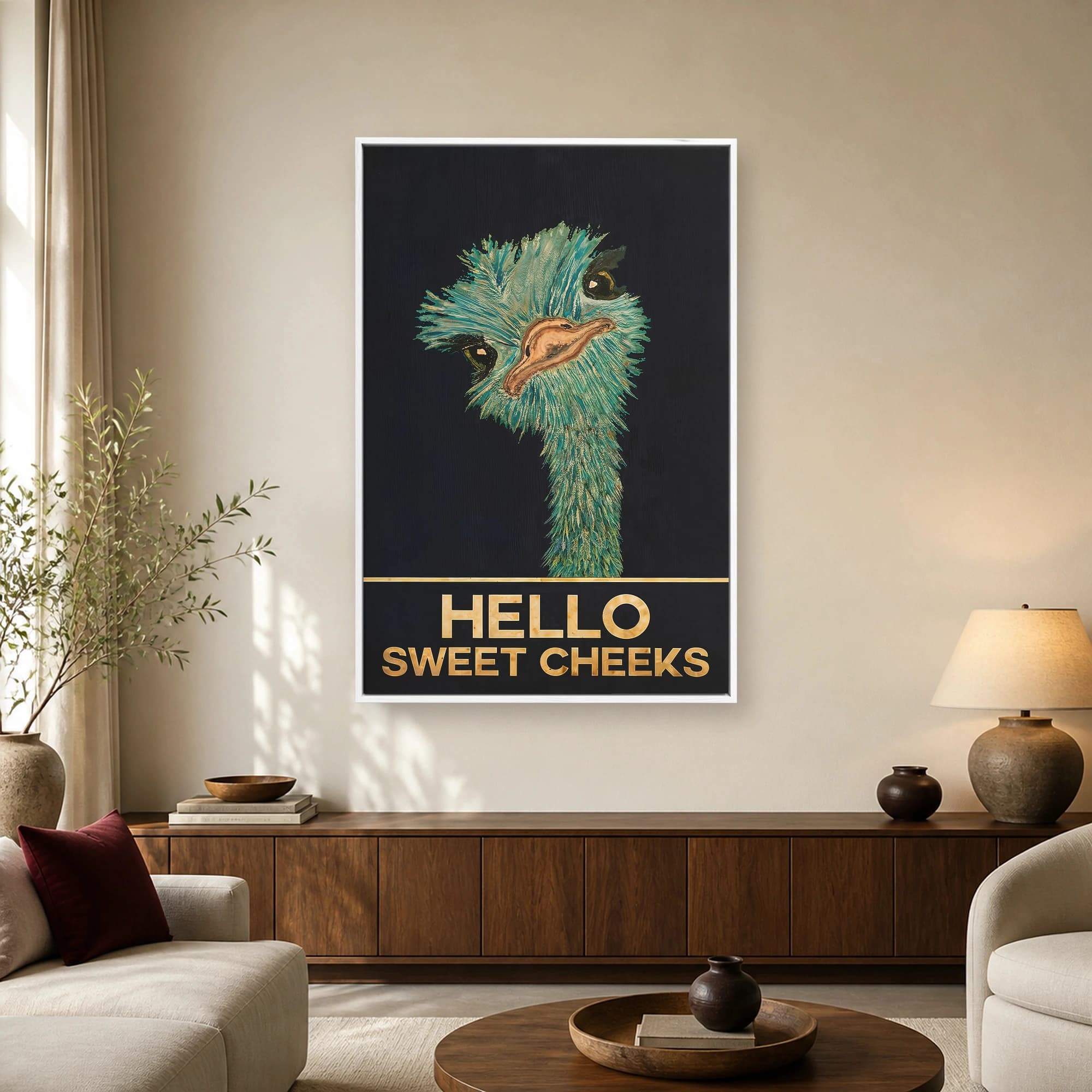 A striking vertical art print featuring an emu with teal and gold fluid-art feathers against a dark background, with gold text reading HELLO SWEET CHEEKS.