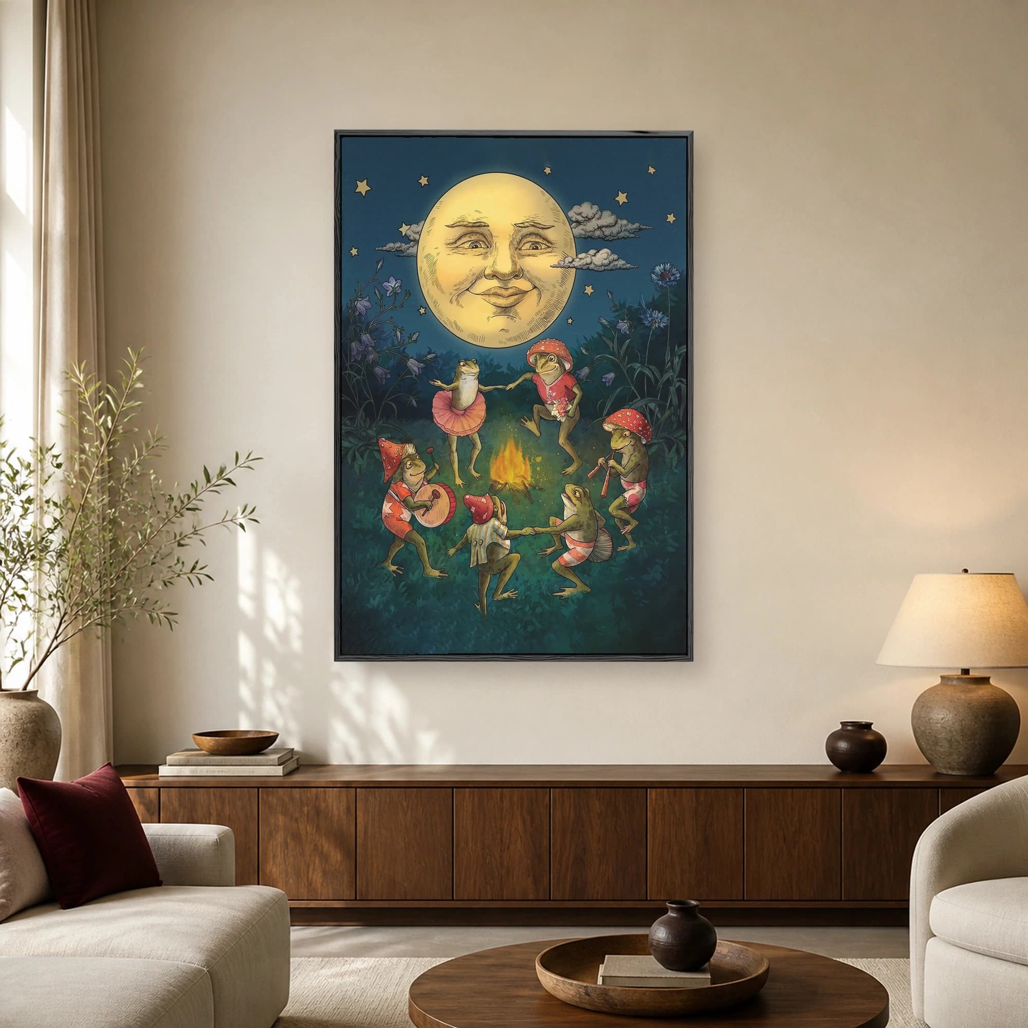 Whimsical illustration of anthropomorphic frogs dancing around a campfire under a large smiling moon in a starlit forest.