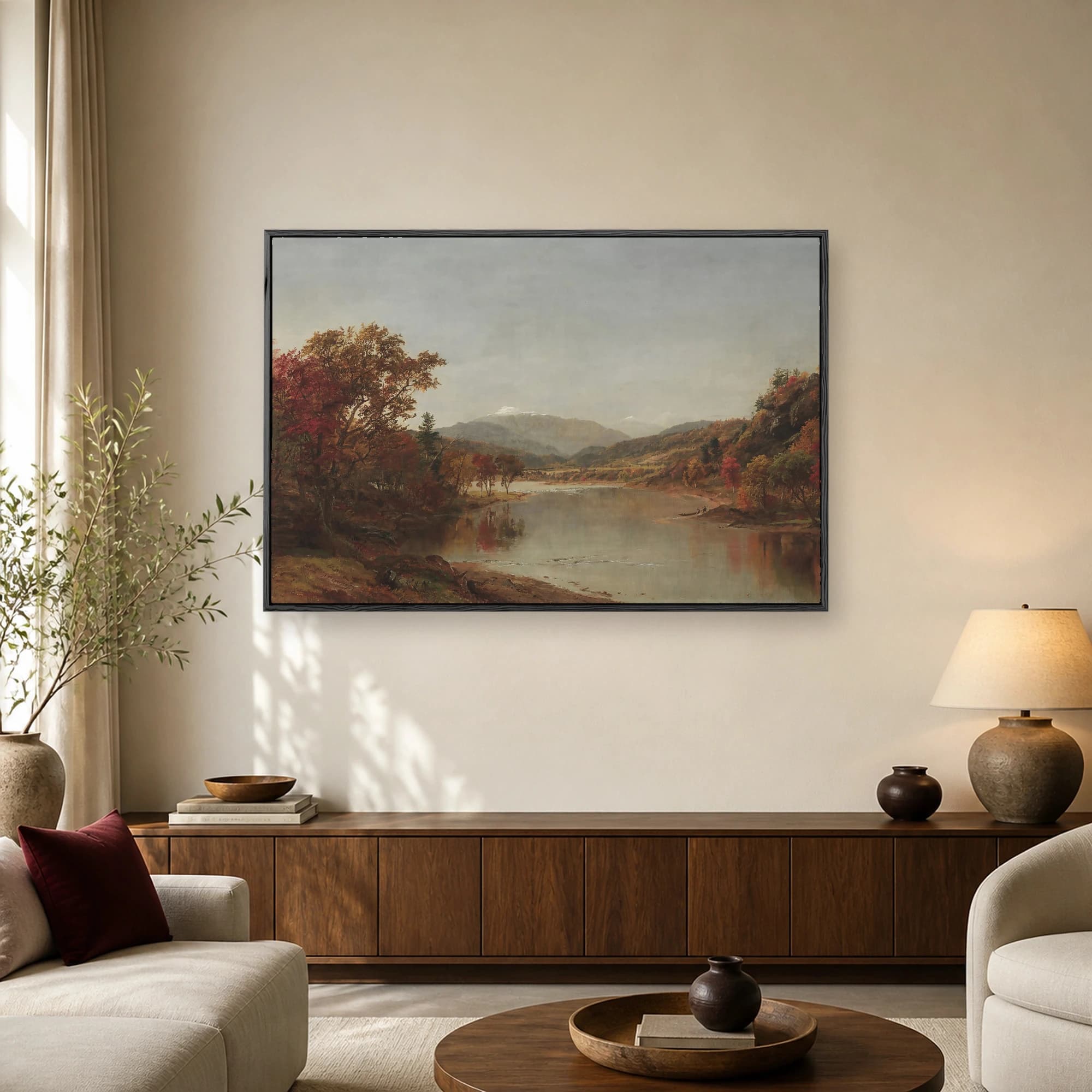 A classic oil painting depicting a wide calm river reflecting autumn trees in red and orange, with snow-capped mountains in the distant background.