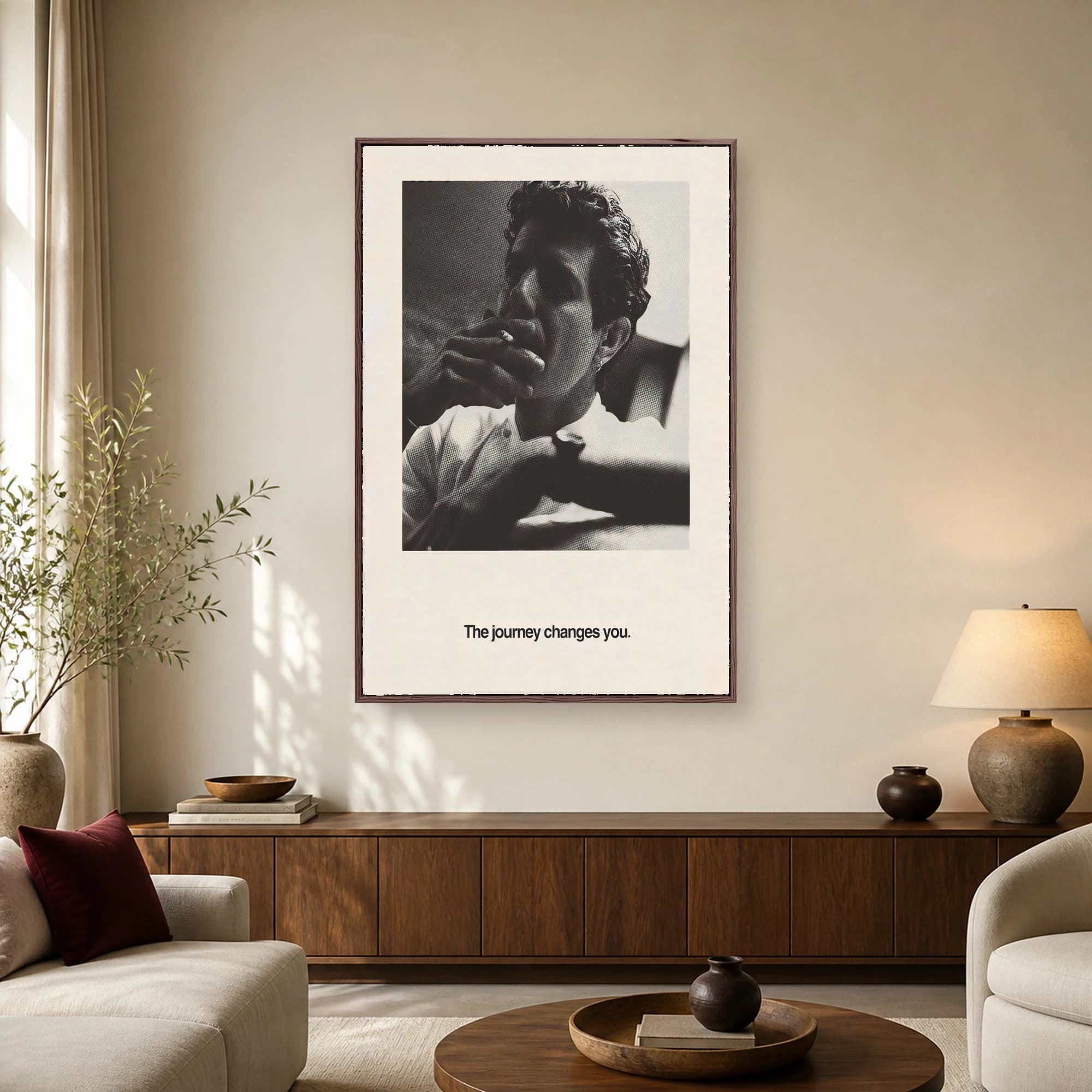 Black and white halftone print poster depicting a man smoking with the tagline The journey changes you at the bottom.