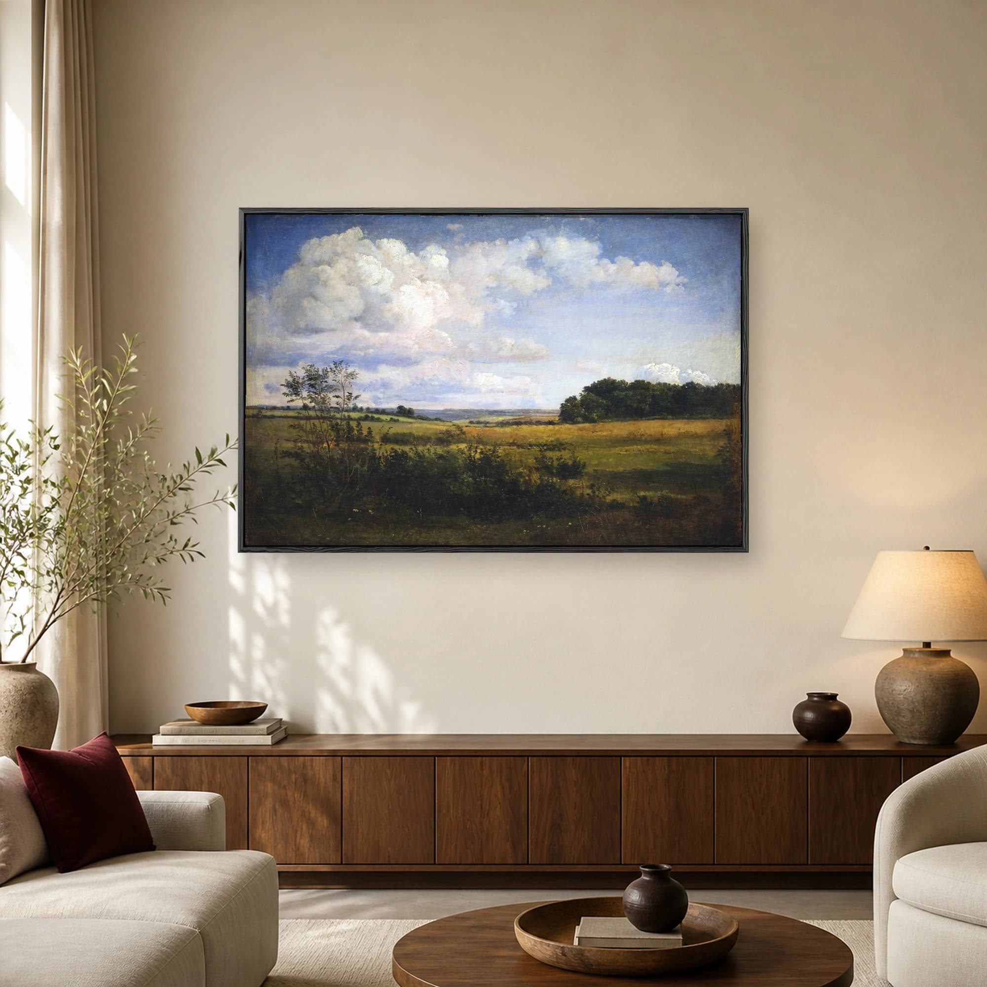 Fine art print of a 19th-century style landscape painting showing large white clouds over a green and gold countryside.