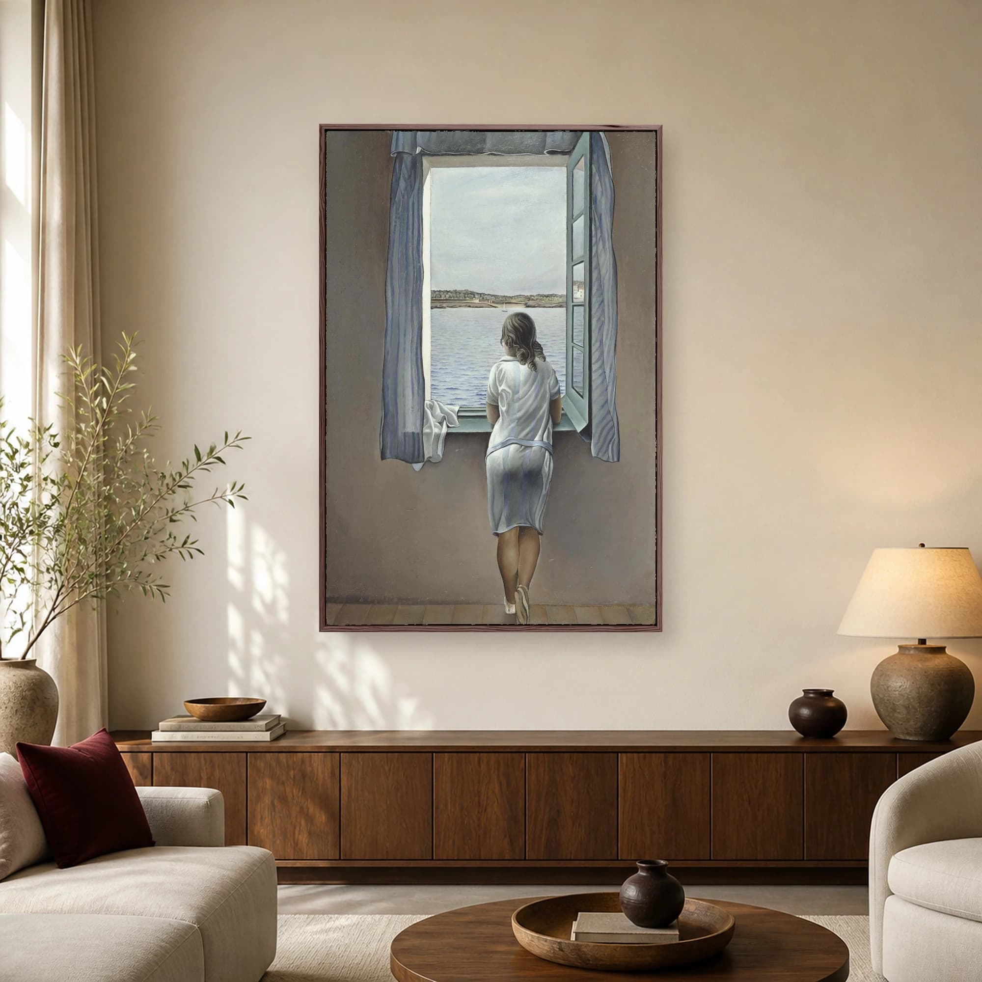 A young woman stands inside looking out an open window at a calm sea in Salvador Dalí's surrealist painting Girl at a Window.