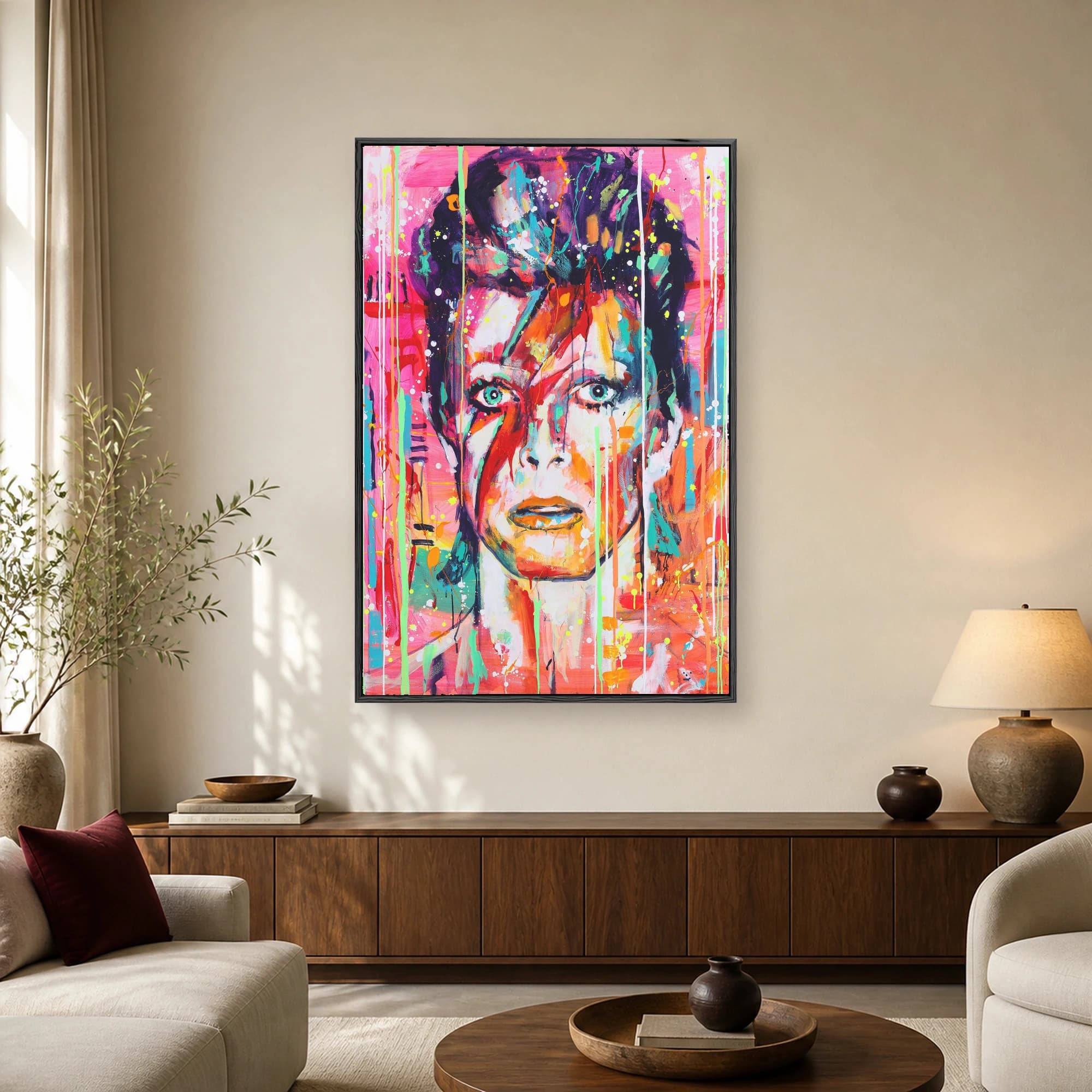 A vibrant pop art portrait of David Bowie featuring colorful neon paint drips and the iconic facial lightning bolt.