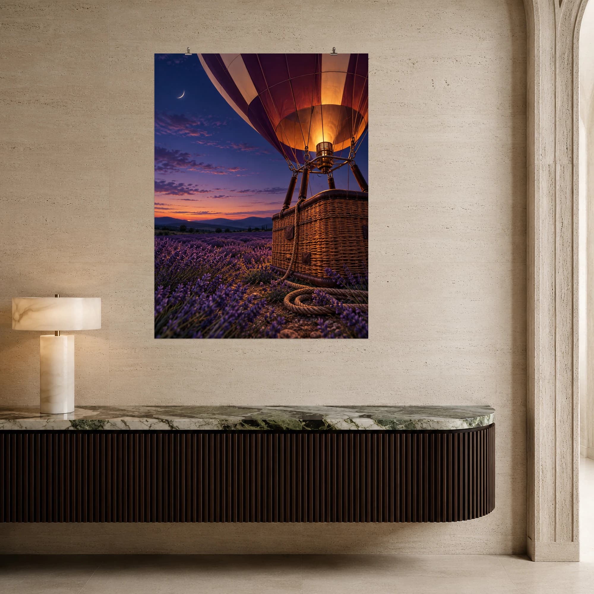 A glowing hot air balloon rests in a lavender meadow beneath a crescent moon at twilight.