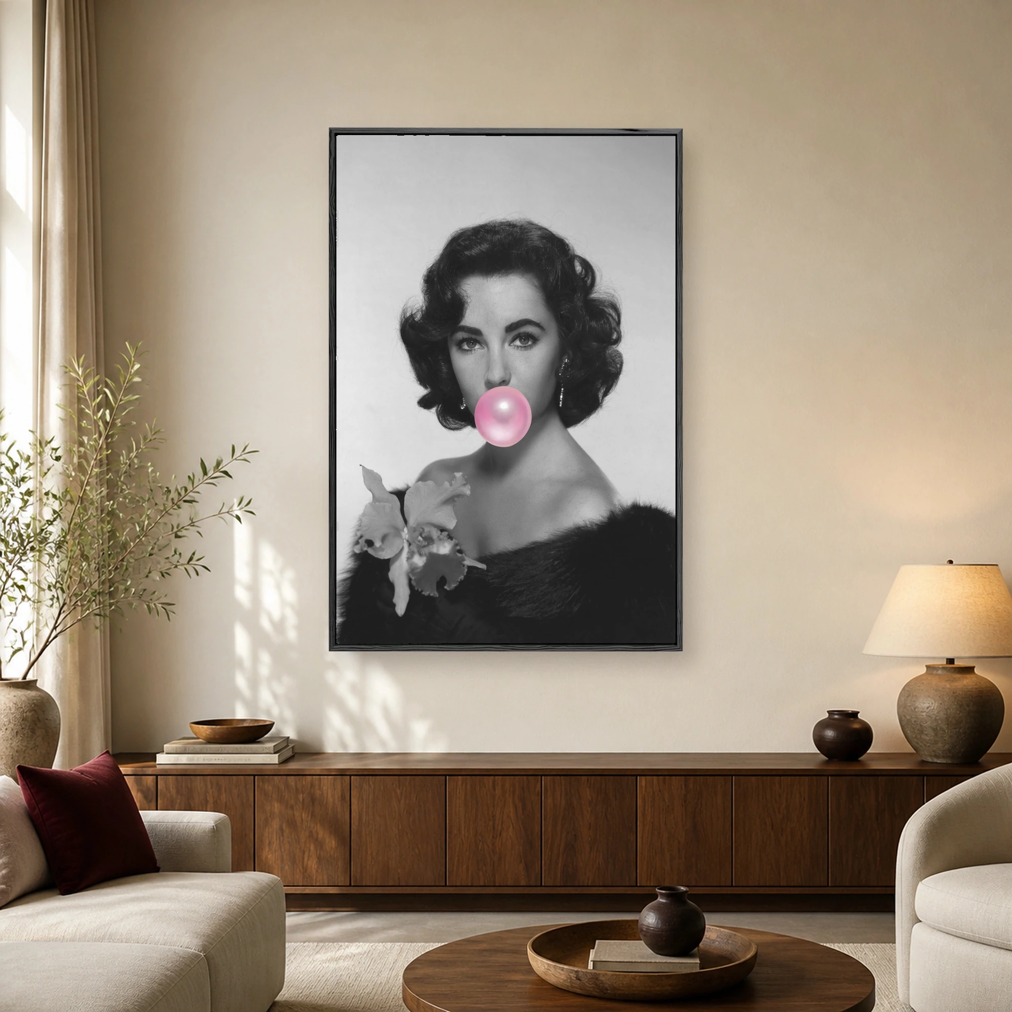 Vintage black-and-white portrait of a 1950s Hollywood actress wearing a fur stole and blowing a bright pink bubblegum bubble