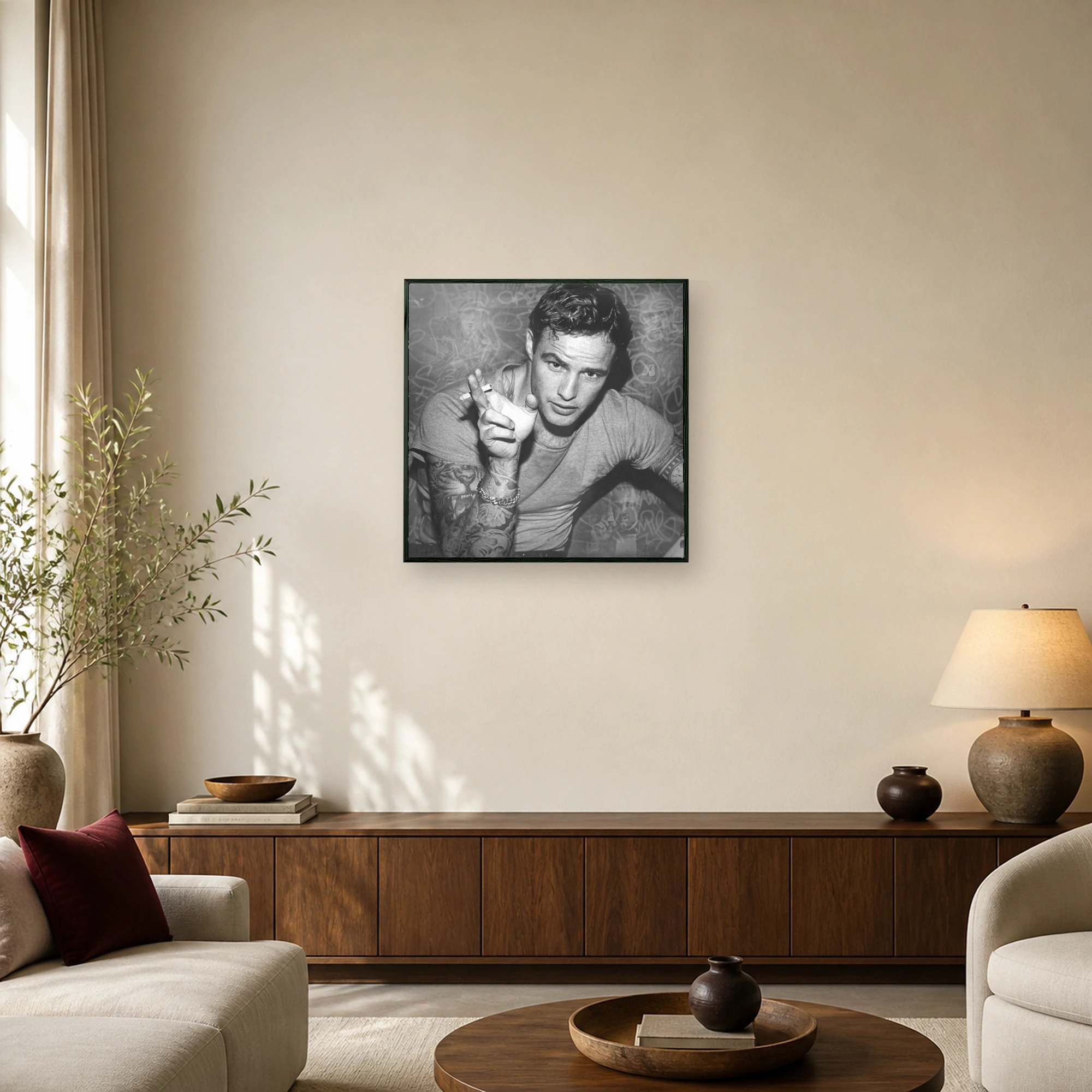 Black and white portrait of Marlon Brando holding a cigarette with tattooed arms and a moody urban background, displayed as wall art.