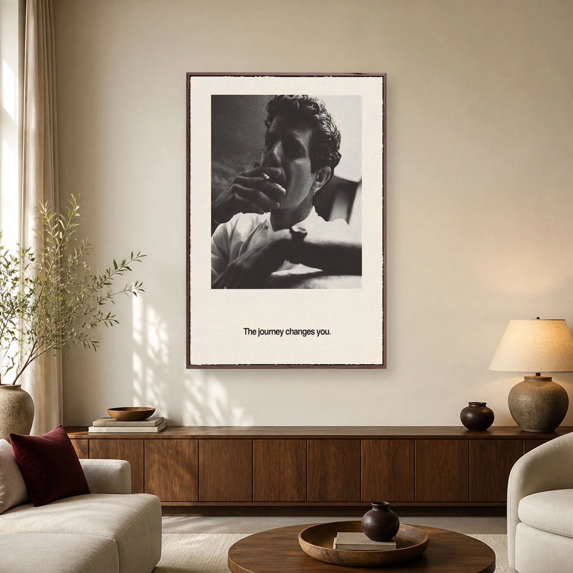 Black and white halftone print poster depicting a man smoking with the tagline The journey changes you at the bottom.
